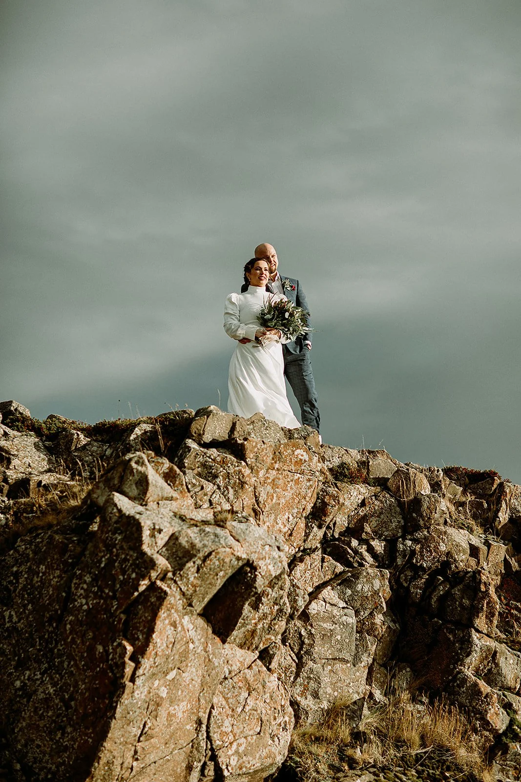 A Private Multi-Area Iceland Elopement by Steph Zakas Photography with wedding couple at fjord