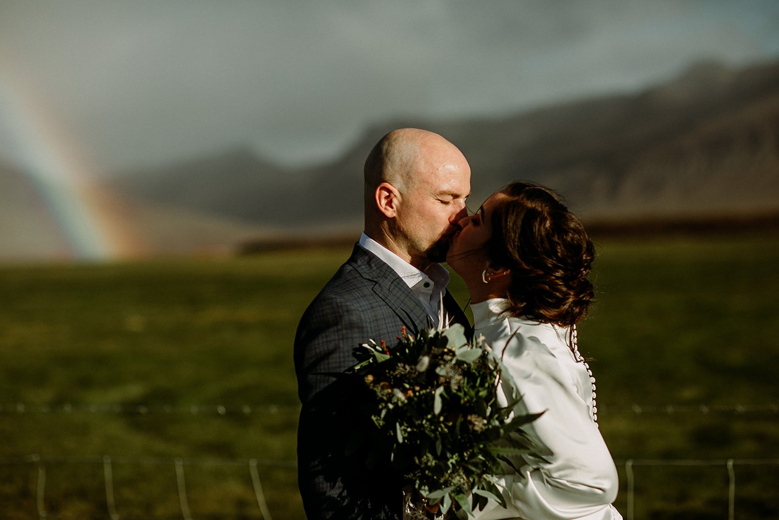 A Private Multi-Area Iceland Elopement by Steph Zakas Photography with wedding couple at fjord