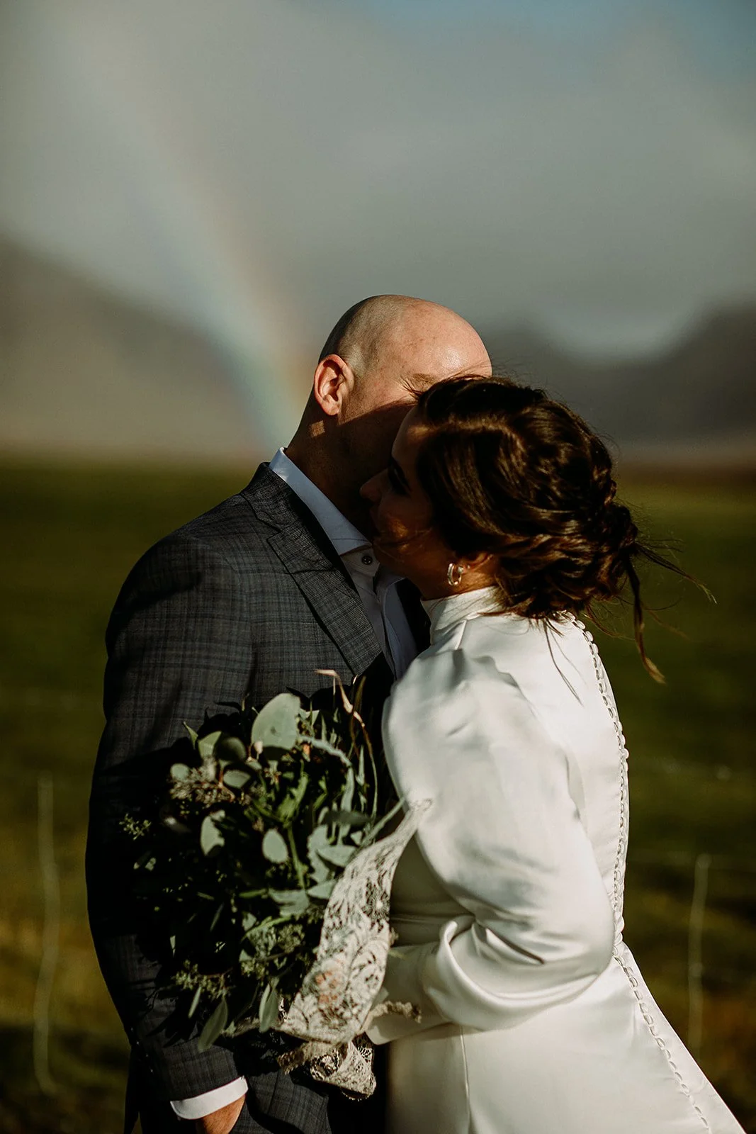A Private Multi-Area Iceland Elopement by Steph Zakas Photography with wedding couple at fjord