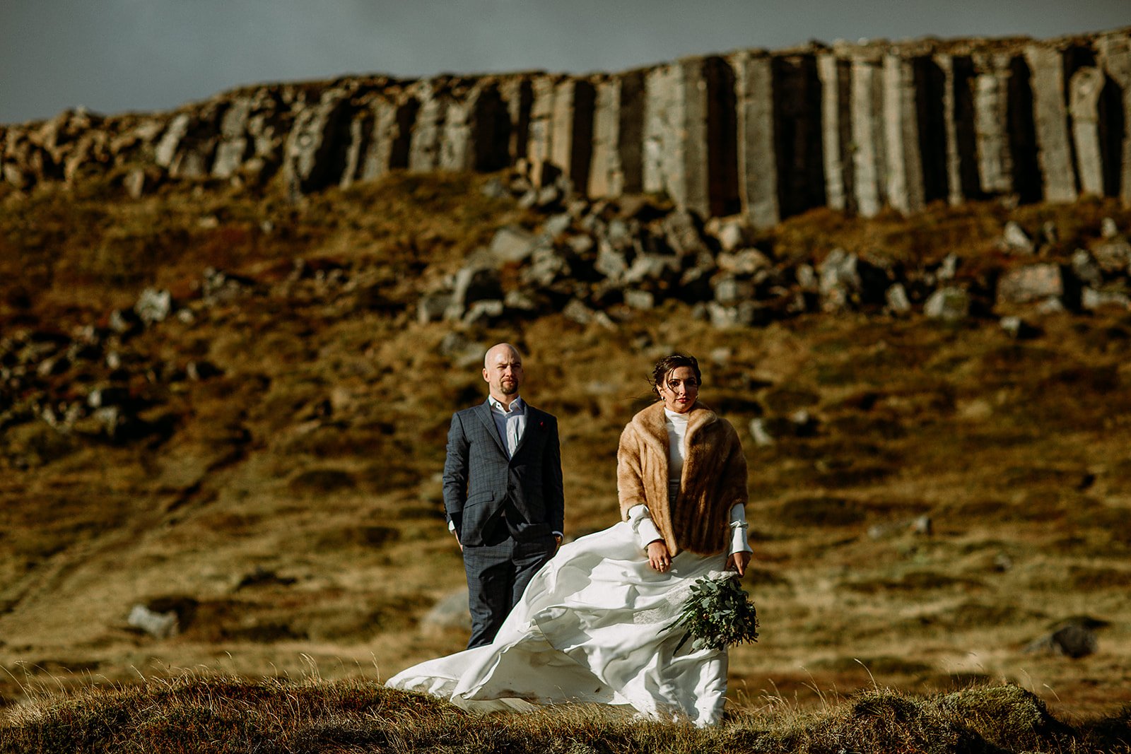 A Private Multi-Area Iceland Elopement by Steph Zakas Photography with wedding couple at fjord