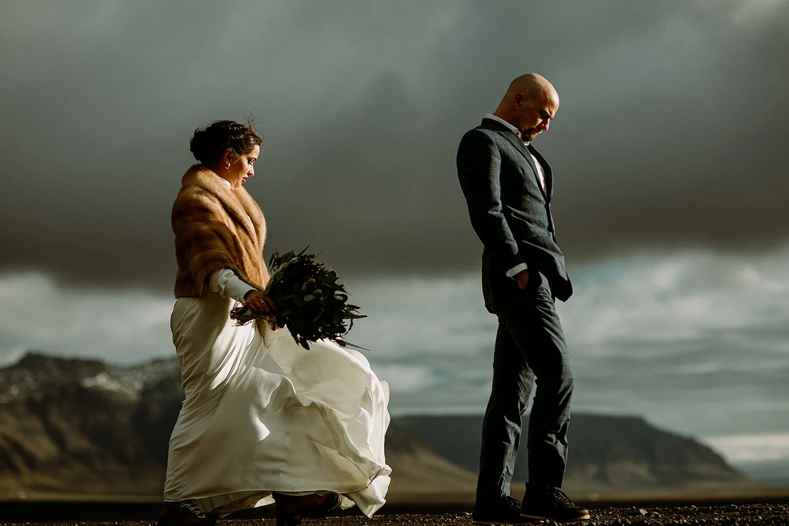 A Private Multi-Area Iceland Elopement by Steph Zakas Photography with wedding couple at fjord