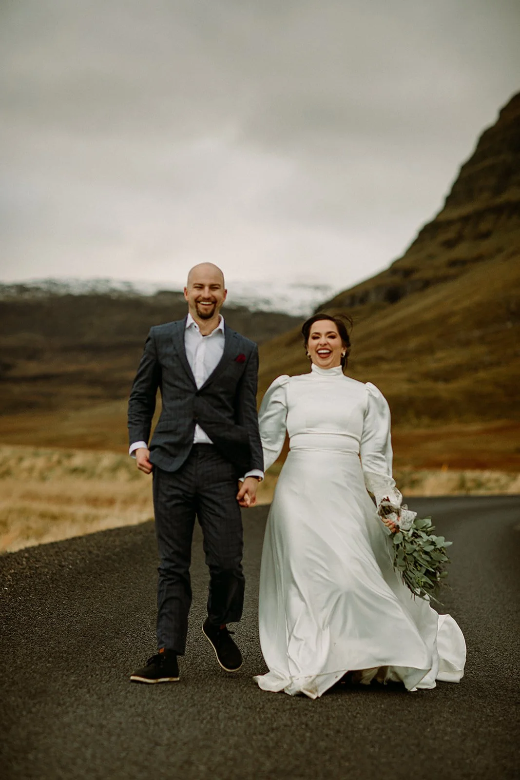 A Private Multi-Area Iceland Elopement by Steph Zakas Photography with wedding couple at mountain