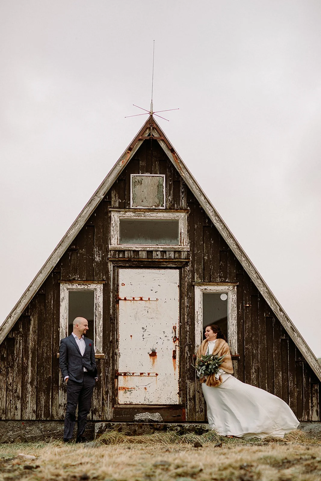A Private Multi-Area Iceland Elopement by Steph Zakas Photography with wedding couple at mountain hut