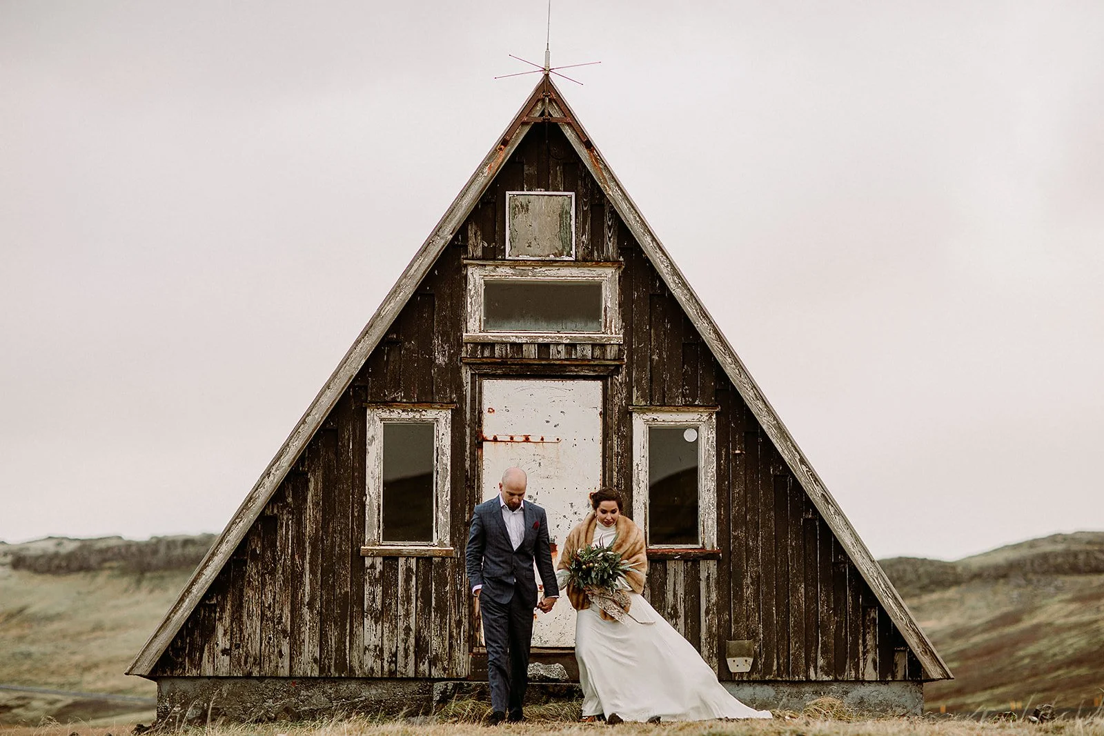 A Private Multi-Area Iceland Elopement by Steph Zakas Photography with wedding couple at mountain hut