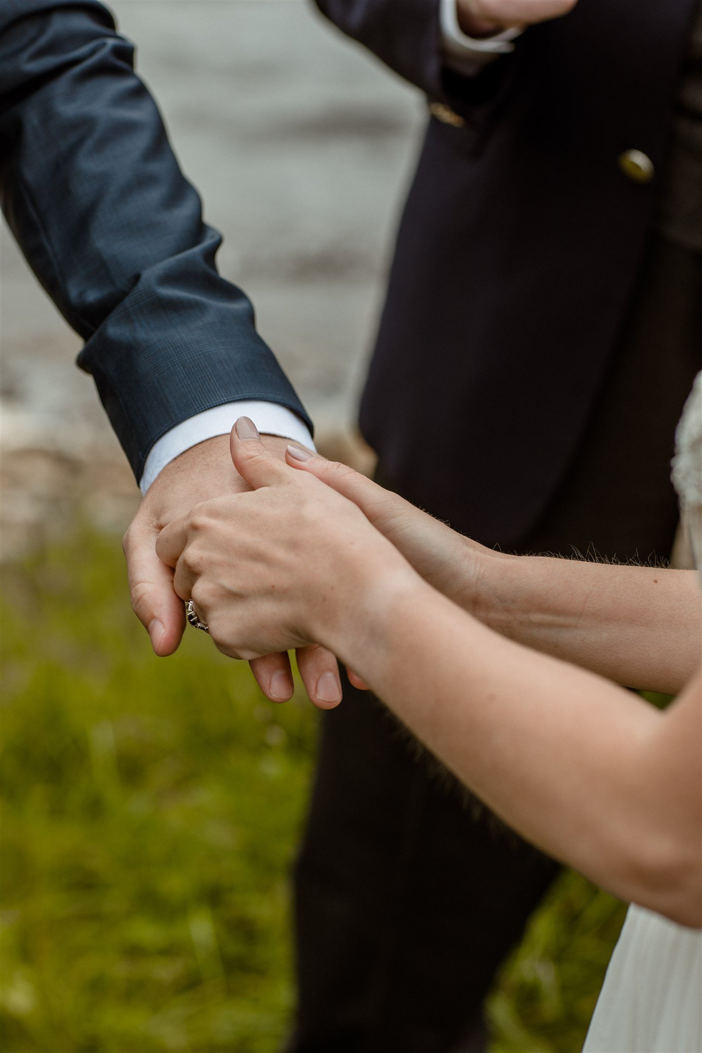  A Private Lake Iceland Elopement Starting in Reykjavík with Guests — at the private ceremony on a private lake with their guests surrounding them 
