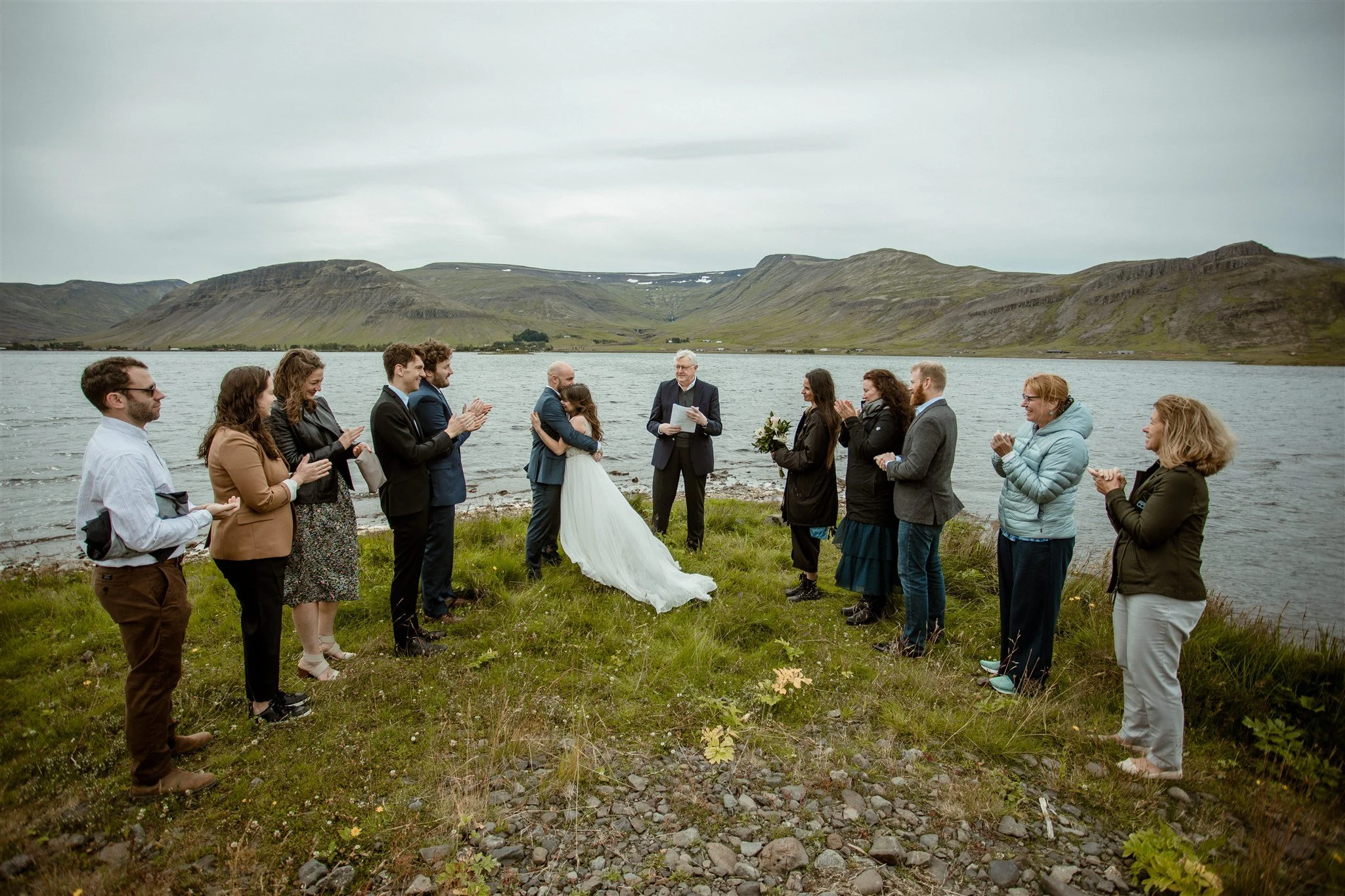  A Private Lake Iceland Elopement Starting in Reykjavík with Guests — couple after ceremony  