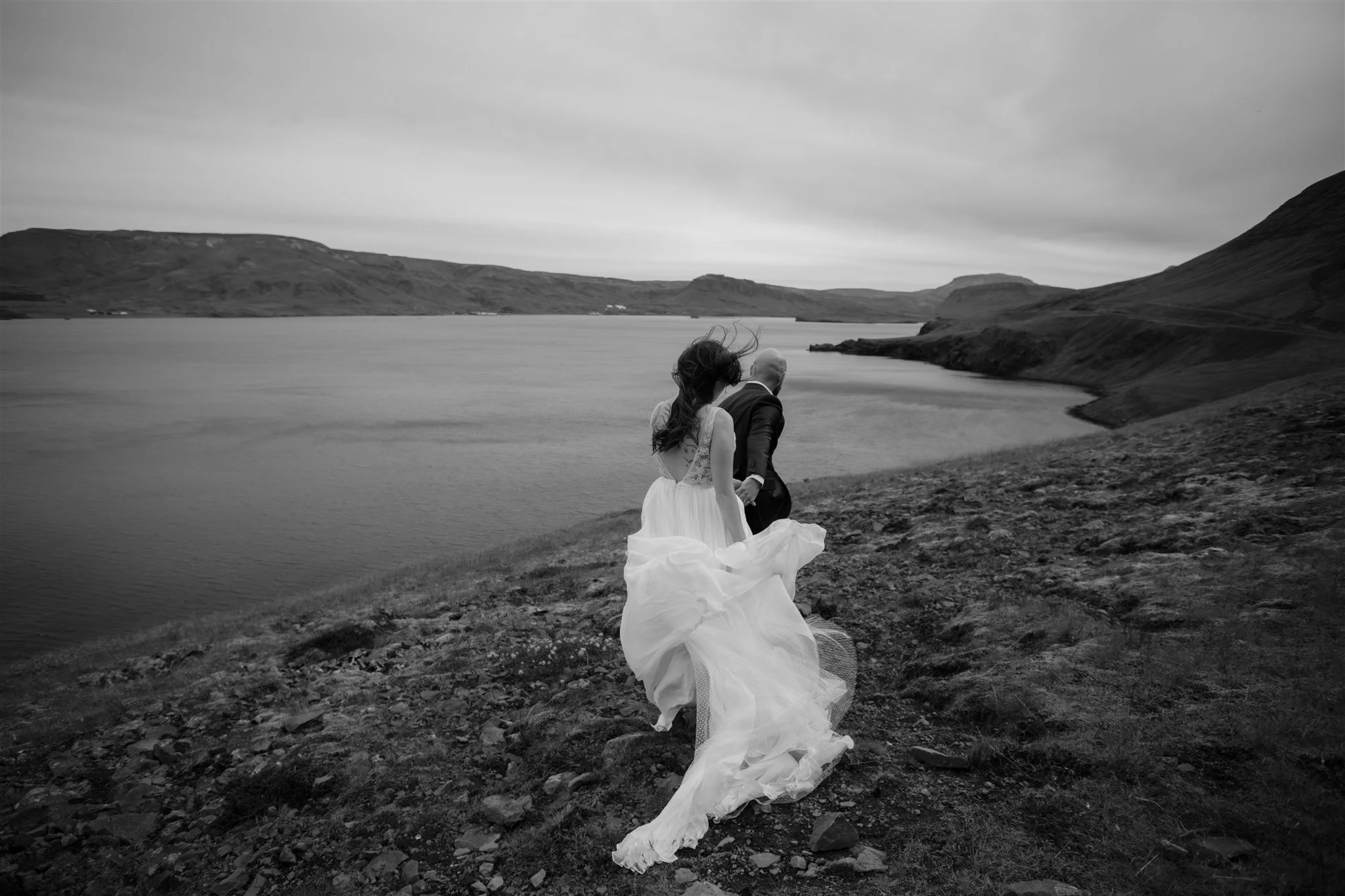  A Private Lake Iceland Elopement Starting in Reykjavík with Guests by Iceland elopement photographer &amp; planner Steph Zakas — couple on an adventure for elopement photos at a fjord  
