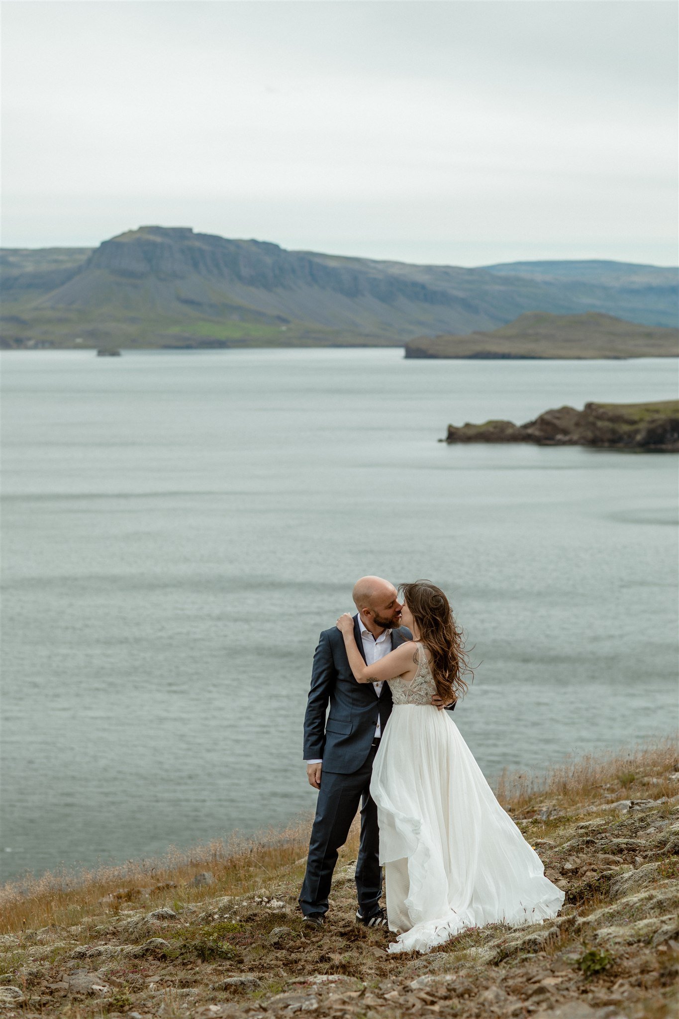  A Private Lake Iceland Elopement Starting in Reykjavík with Guests by Iceland elopement photographer &amp; planner Steph Zakas — couple on an adventure for elopement photos at a fjord  