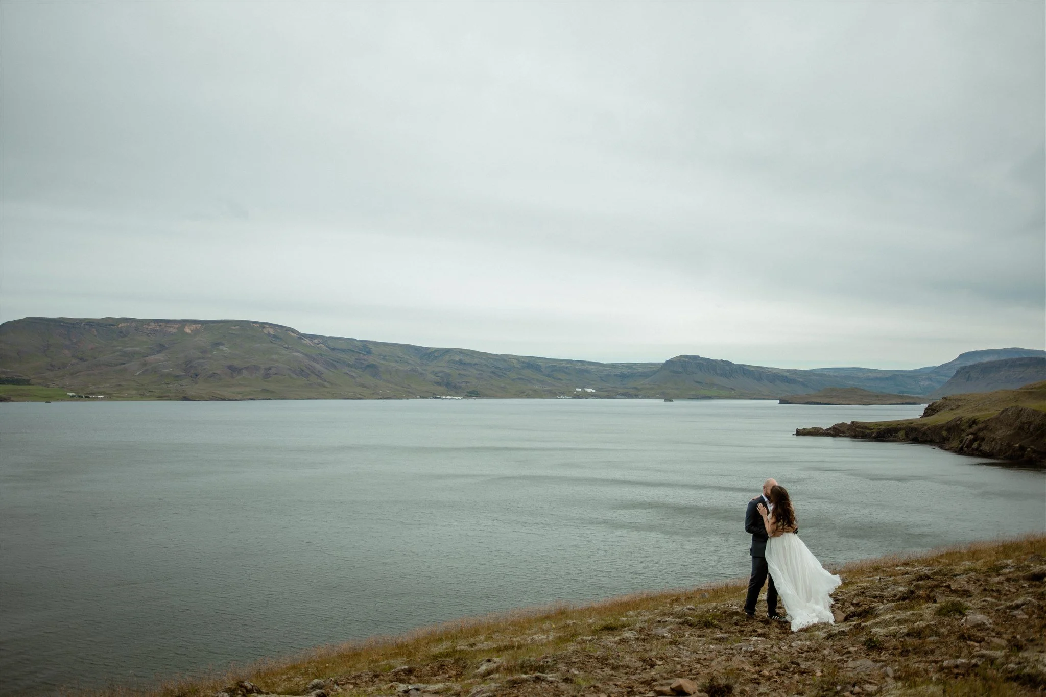  A Private Lake Iceland Elopement Starting in Reykjavík with Guests by Iceland elopement photographer &amp; planner Steph Zakas — couple on an adventure for elopement photos at a fjord  