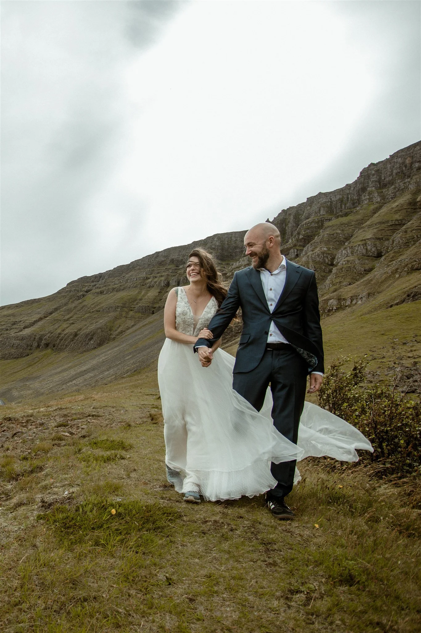  A Private Lake Iceland Elopement Starting in Reykjavík with Guests by Iceland elopement photographer &amp; planner Steph Zakas — couple on an adventure for elopement photos at a fjord  