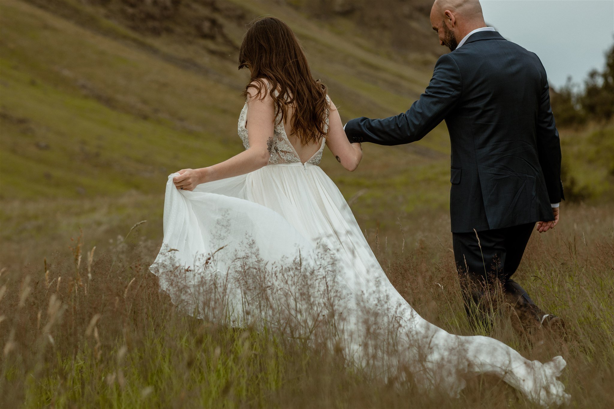  A Private Lake Iceland Elopement Starting in Reykjavík with Guests by Iceland elopement photographer &amp; planner Steph Zakas — couple on an adventure for elopement photos at a mountain 