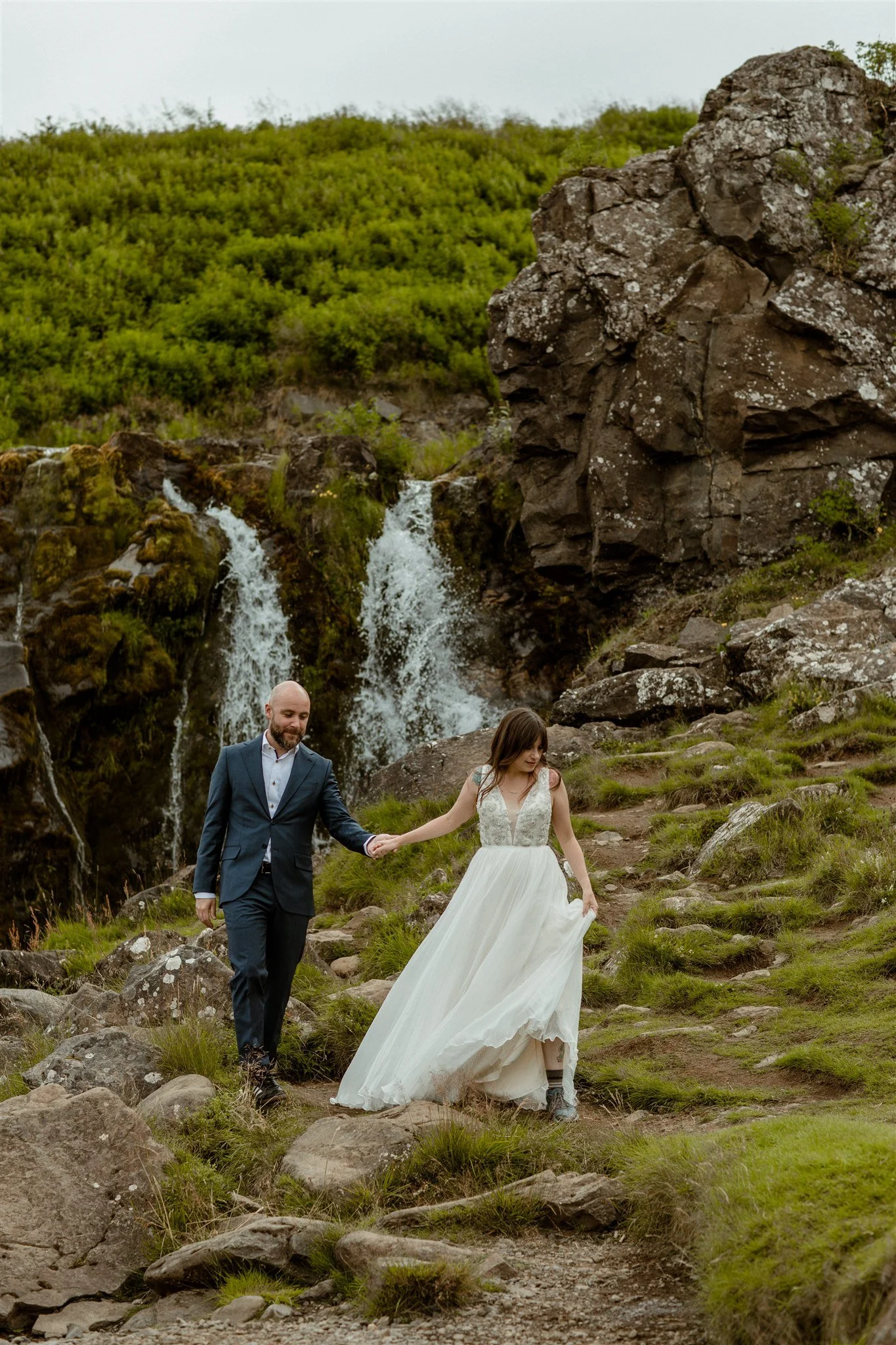  A Private Lake Iceland Elopement Starting in Reykjavík with Guests by Iceland elopement photographer &amp; planner Steph Zakas — couple on an adventure for elopement photos at a private waterfall 