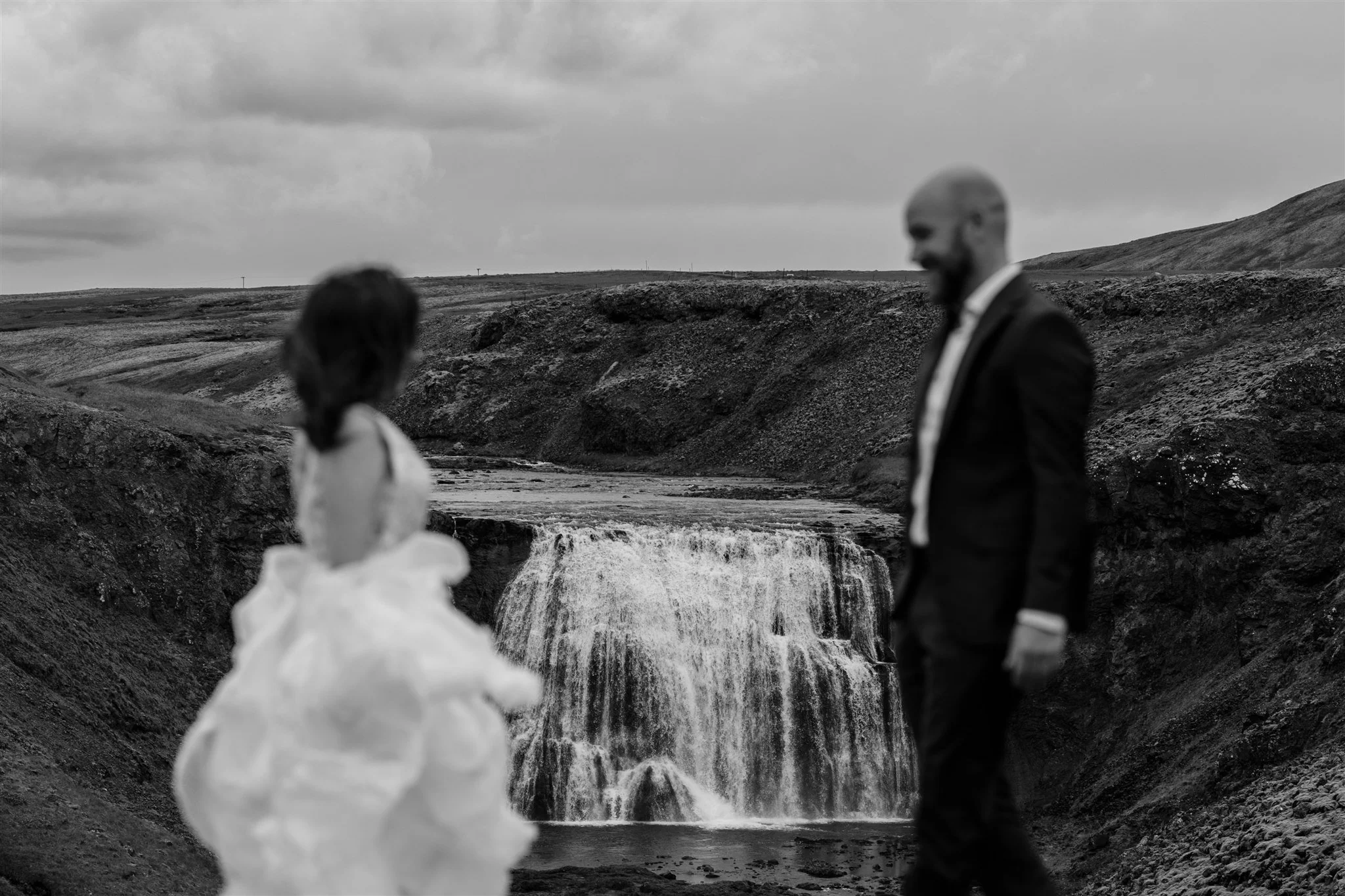  A Private Lake Iceland Elopement Starting in Reykjavík with Guests by Iceland elopement photographer &amp; planner Steph Zakas — couple on an adventure for elopement photos at a private waterfall 