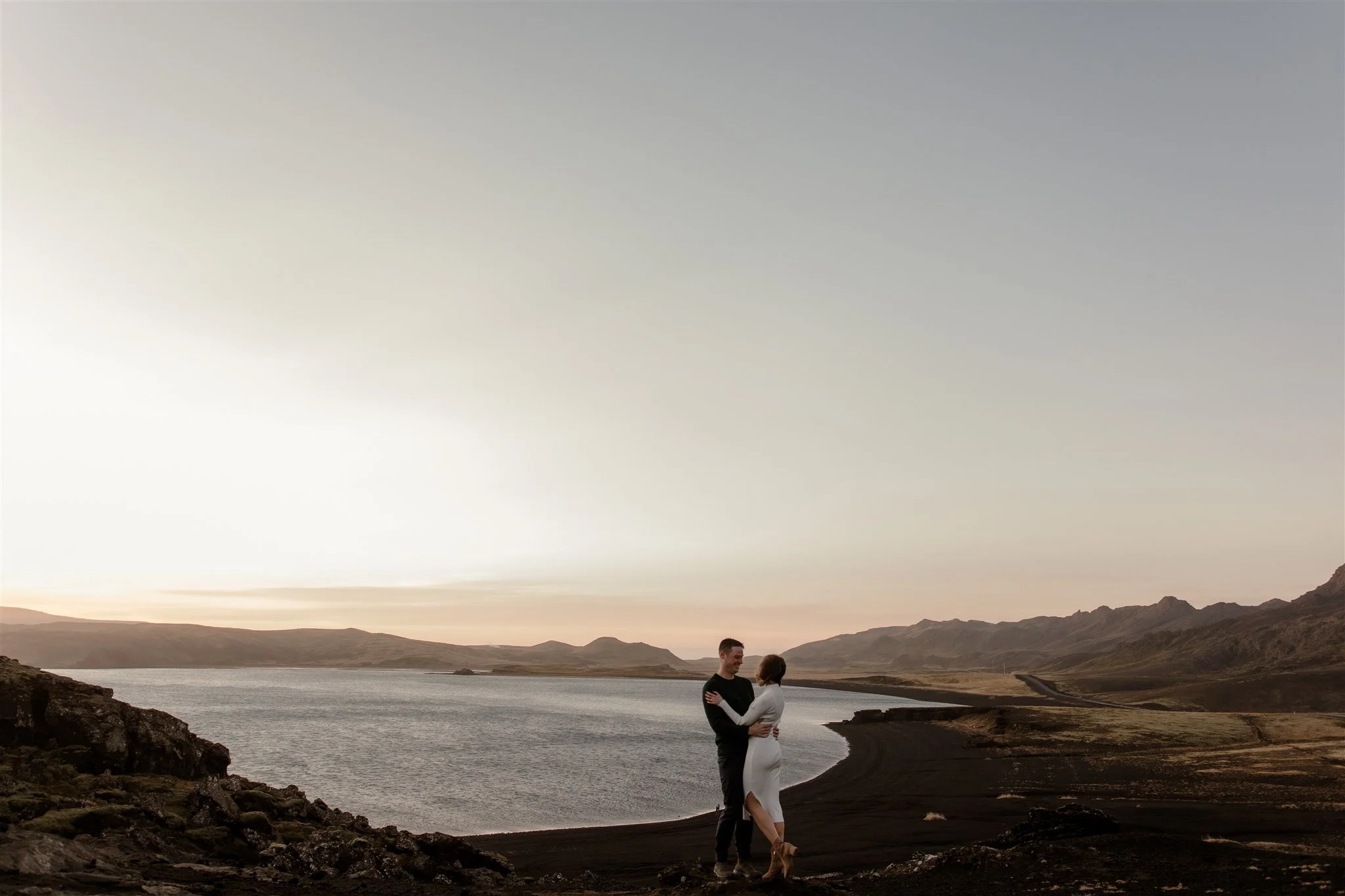  Iceland engagement photo with sunrise dreamy light with couple by water by Iceland engagement proposal photographer steph zakas 