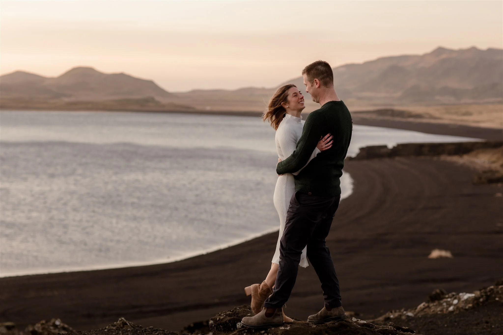  Iceland engagement photo with sunrise dreamy light with couple by water by Iceland engagement proposal photographer steph zakas 