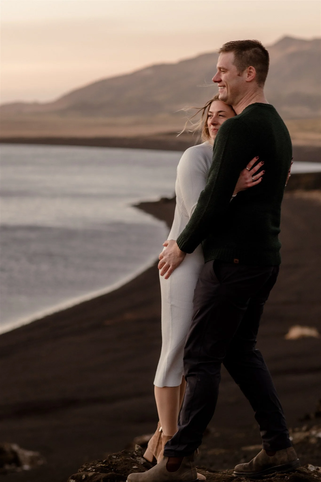  Iceland engagement photo with sunrise dreamy light with couple by water by Iceland engagement proposal photographer steph zakas 