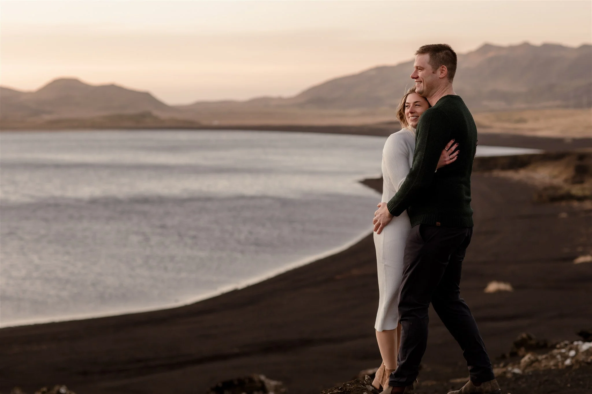  Iceland engagement photo with sunrise dreamy light with couple by water by Iceland engagement proposal photographer steph zakas 