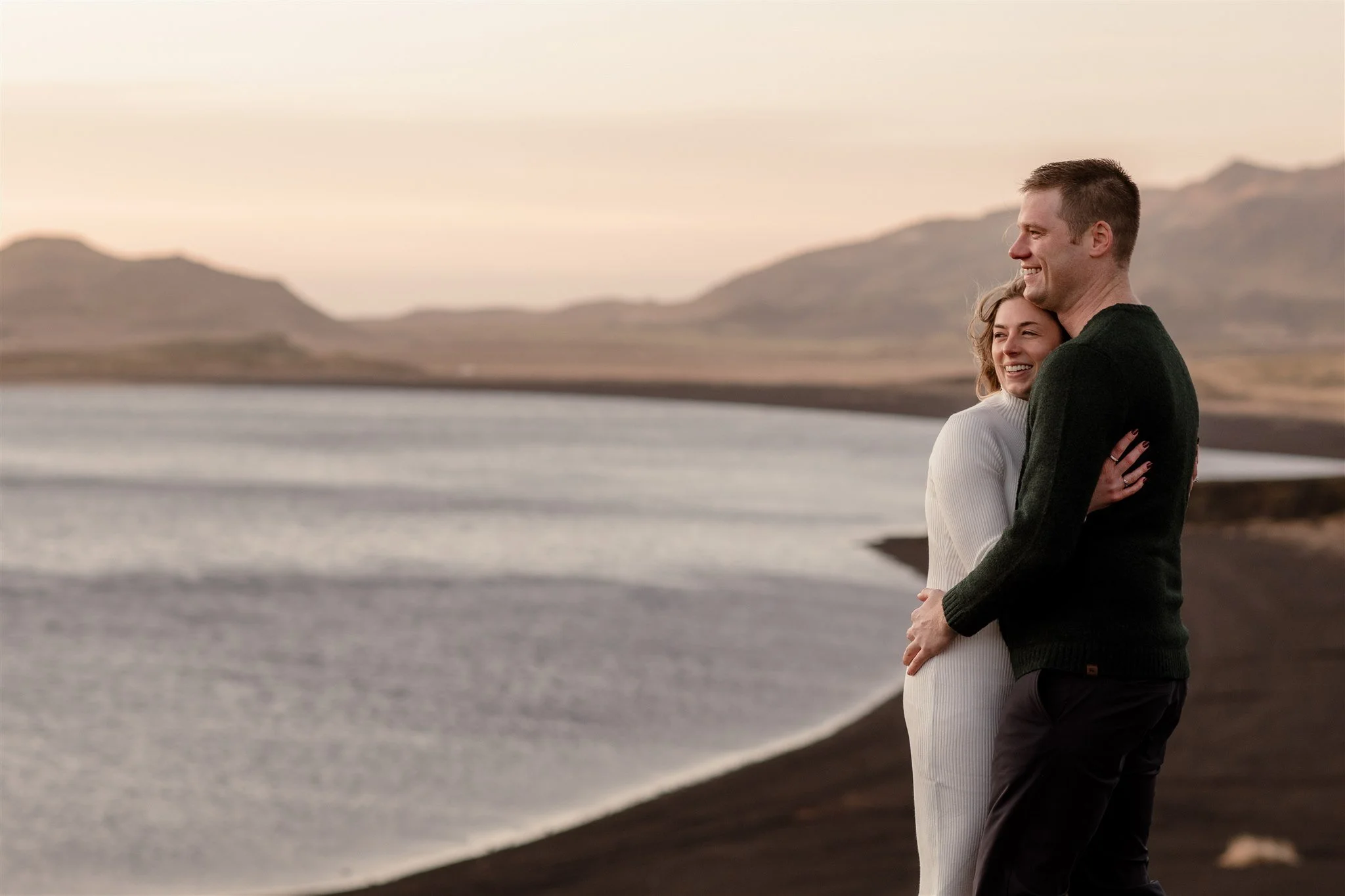  Iceland engagement photo with sunrise dreamy light with couple by water by Iceland engagement proposal photographer steph zakas 