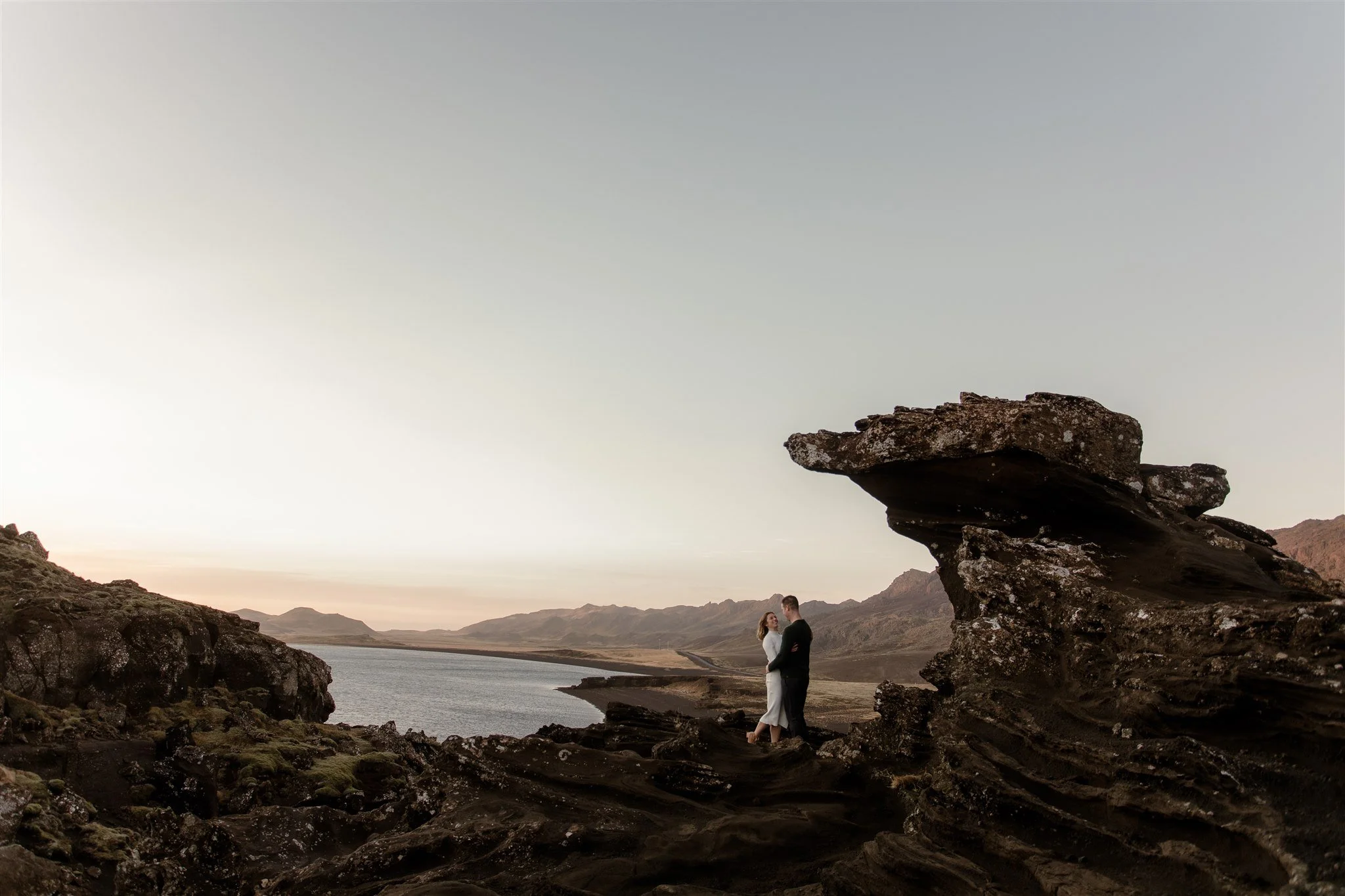  Iceland engagement photo with sunrise dreamy light with couple by water by Iceland engagement proposal photographer steph zakas 