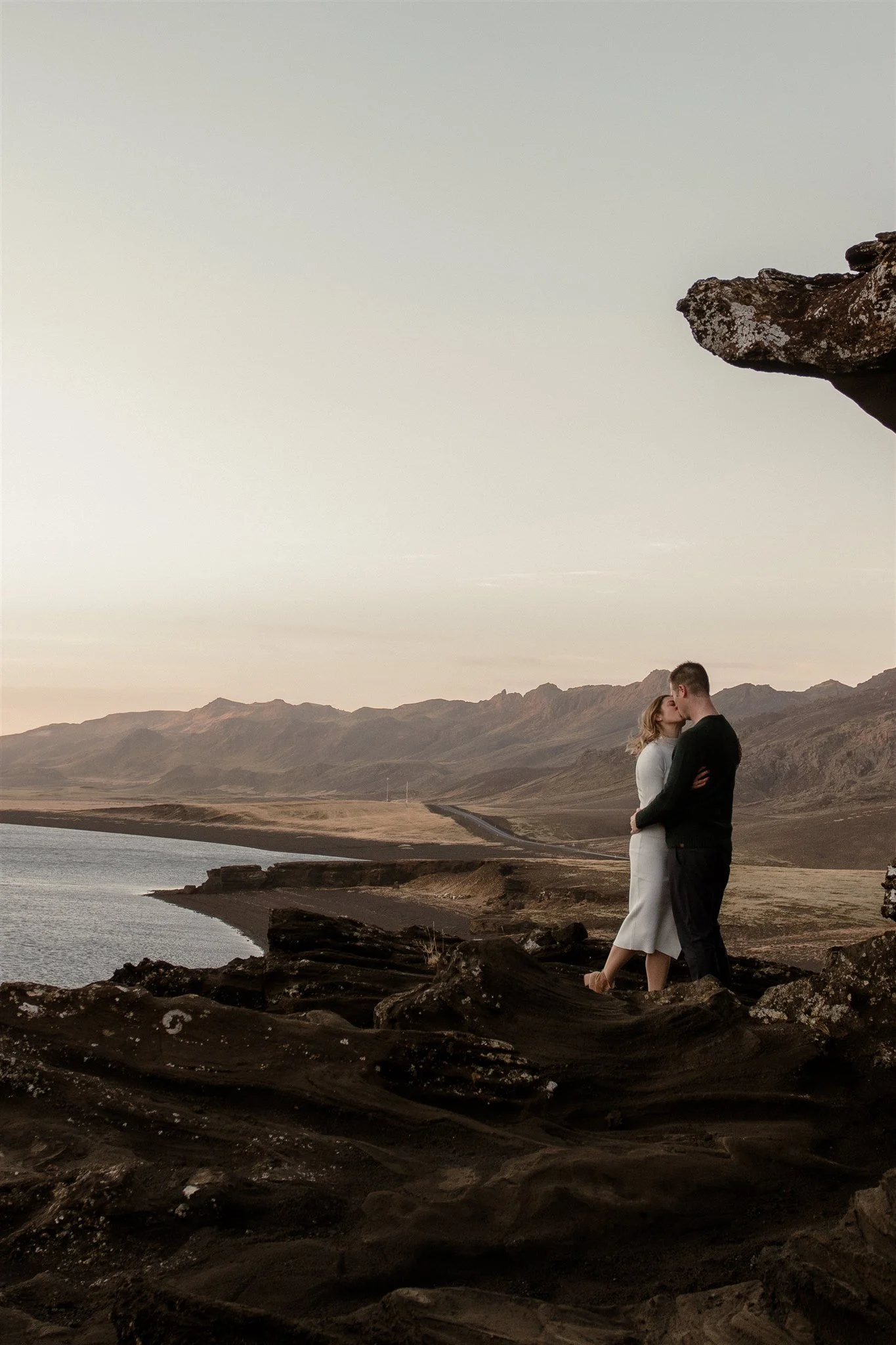  Iceland engagement photo with sunrise dreamy light with couple by water by Iceland engagement proposal photographer steph zakas 