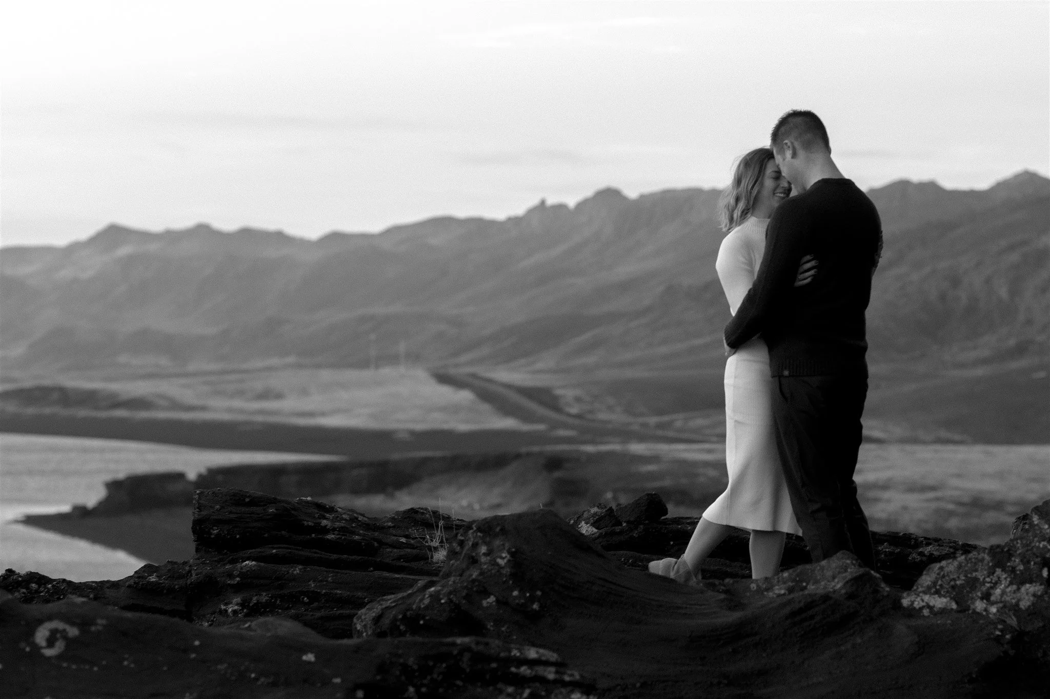  Iceland engagement photo with sunrise dreamy light with couple by water by Iceland engagement proposal photographer steph zakas 