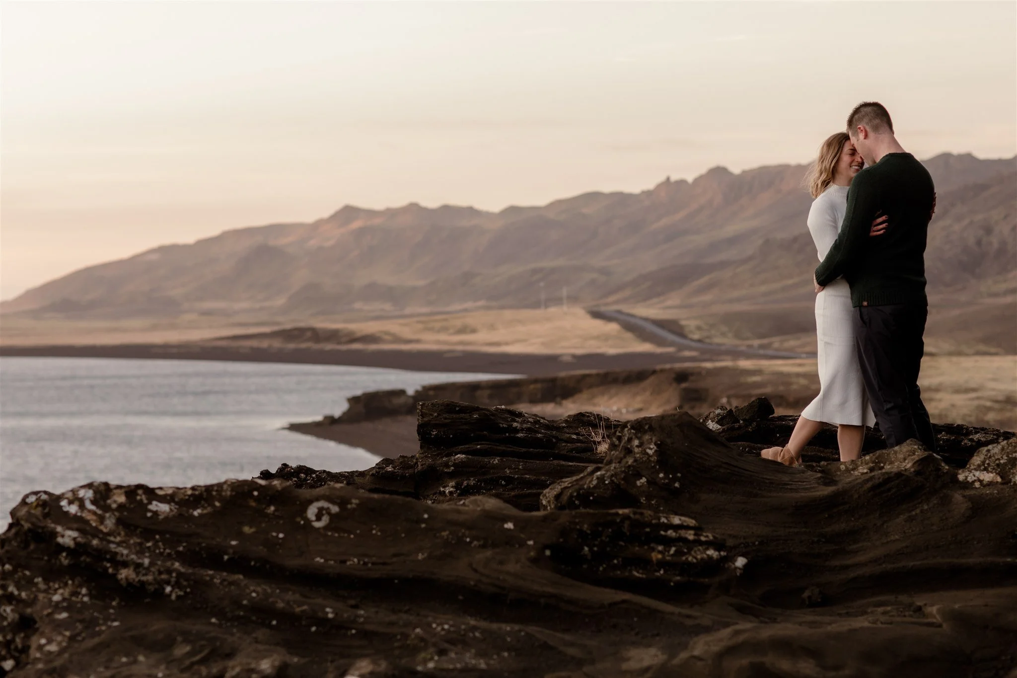  Iceland engagement photo with sunrise dreamy light with couple by water by Iceland engagement proposal photographer steph zakas 
