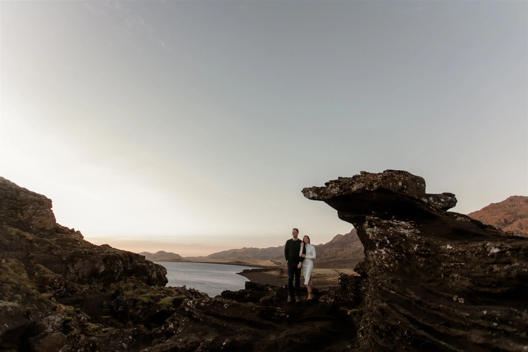  Iceland engagement photo with sunrise dreamy light with couple by water by Iceland engagement proposal photographer steph zakas 