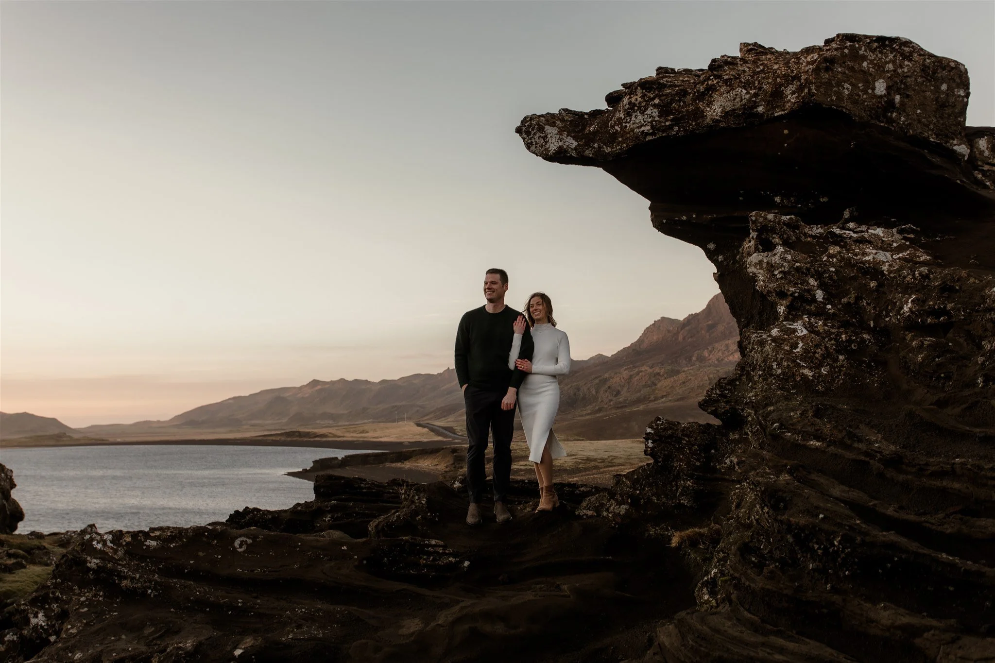  Iceland engagement photo with sunrise dreamy light with couple by water by Iceland engagement proposal photographer steph zakas 