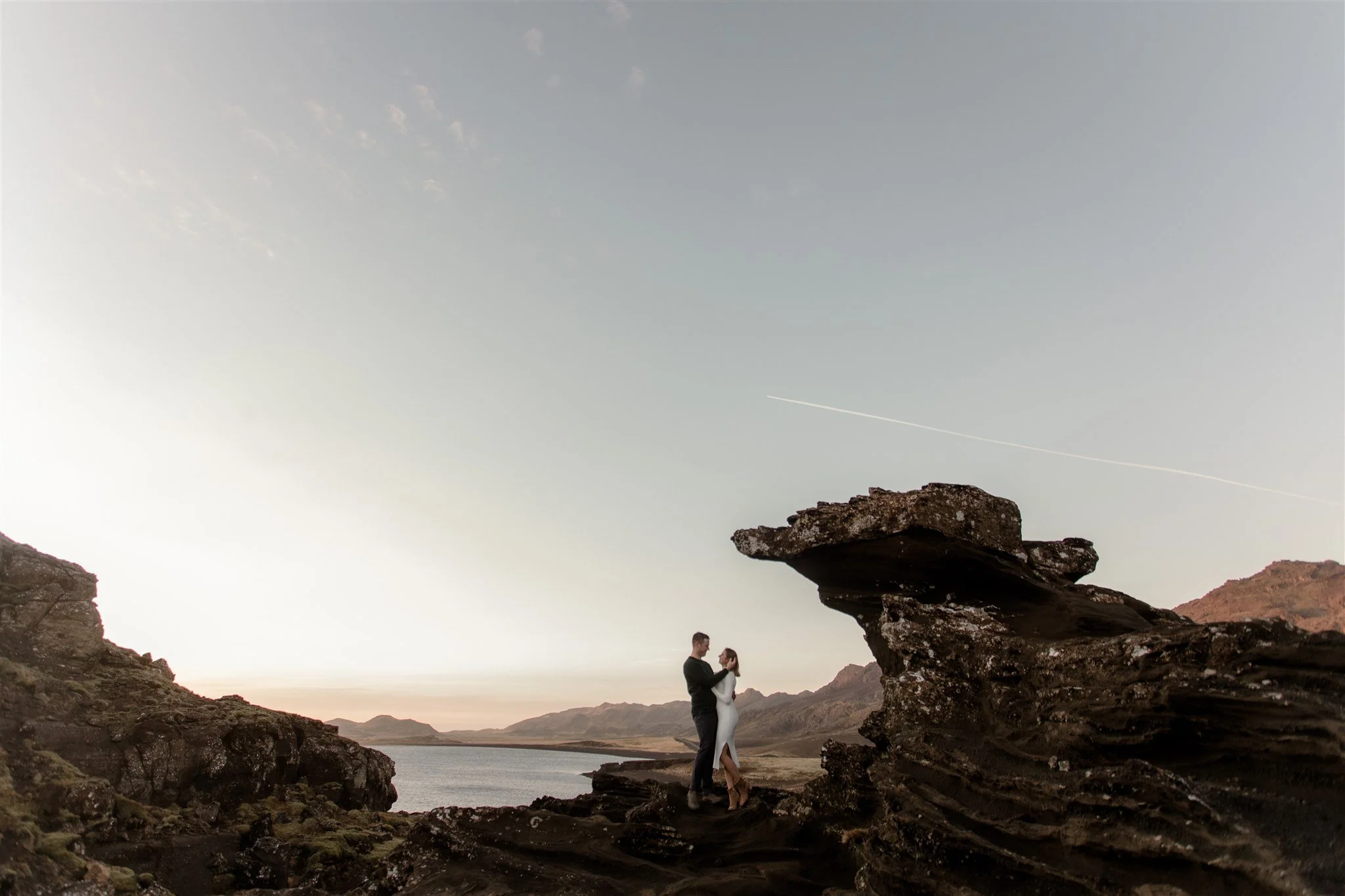  Iceland engagement photo with sunrise dreamy light with couple by water by Iceland engagement proposal photographer steph zakas 