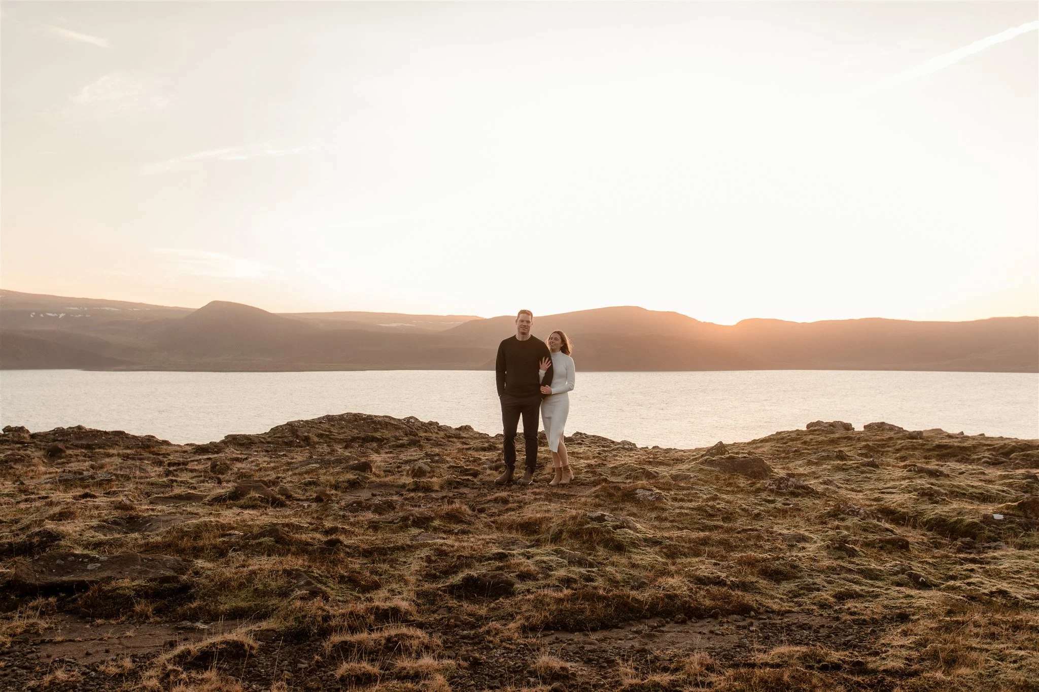  Iceland engagement photo with sunrise dreamy light with couple by water by Iceland engagement proposal photographer steph zakas 