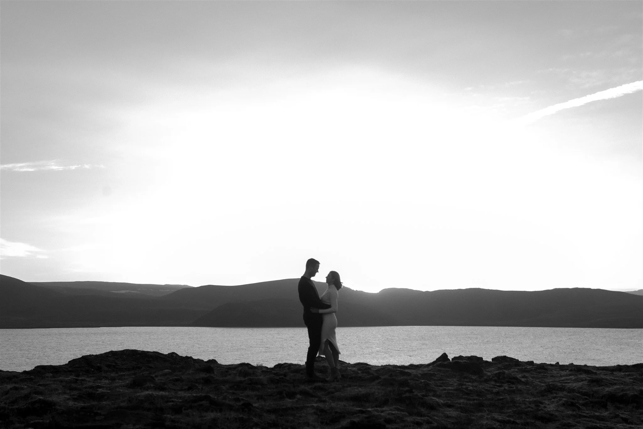  Iceland engagement photo with sunrise dreamy light with couple by water by Iceland engagement proposal photographer steph zakas 