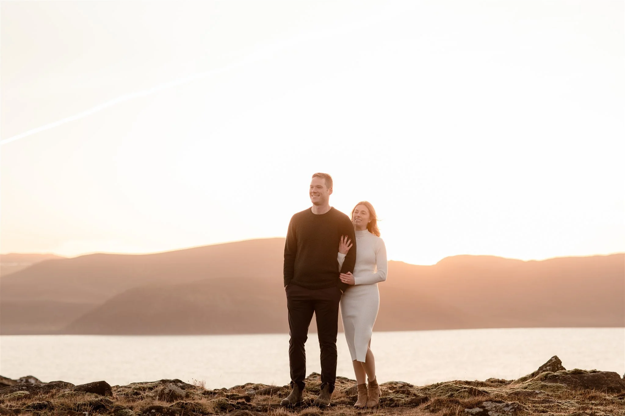  Iceland engagement photo with sunrise dreamy light with couple by water by Iceland engagement proposal photographer steph zakas 