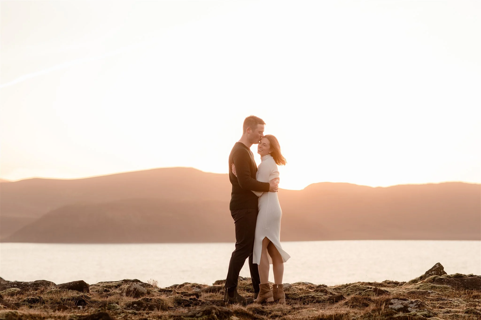  Iceland engagement photo with sunrise dreamy light with couple by water by Iceland engagement proposal photographer steph zakas 