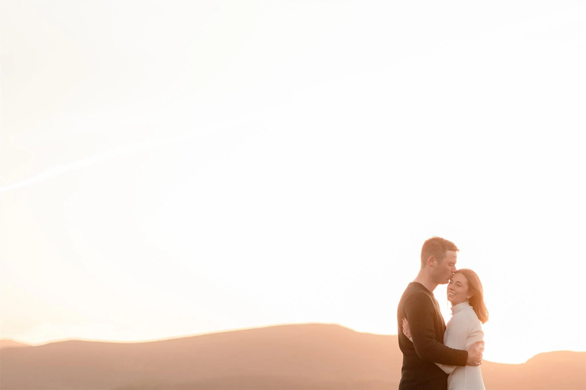  Iceland engagement photo with sunrise dreamy light with couple by water by Iceland engagement proposal photographer steph zakas 