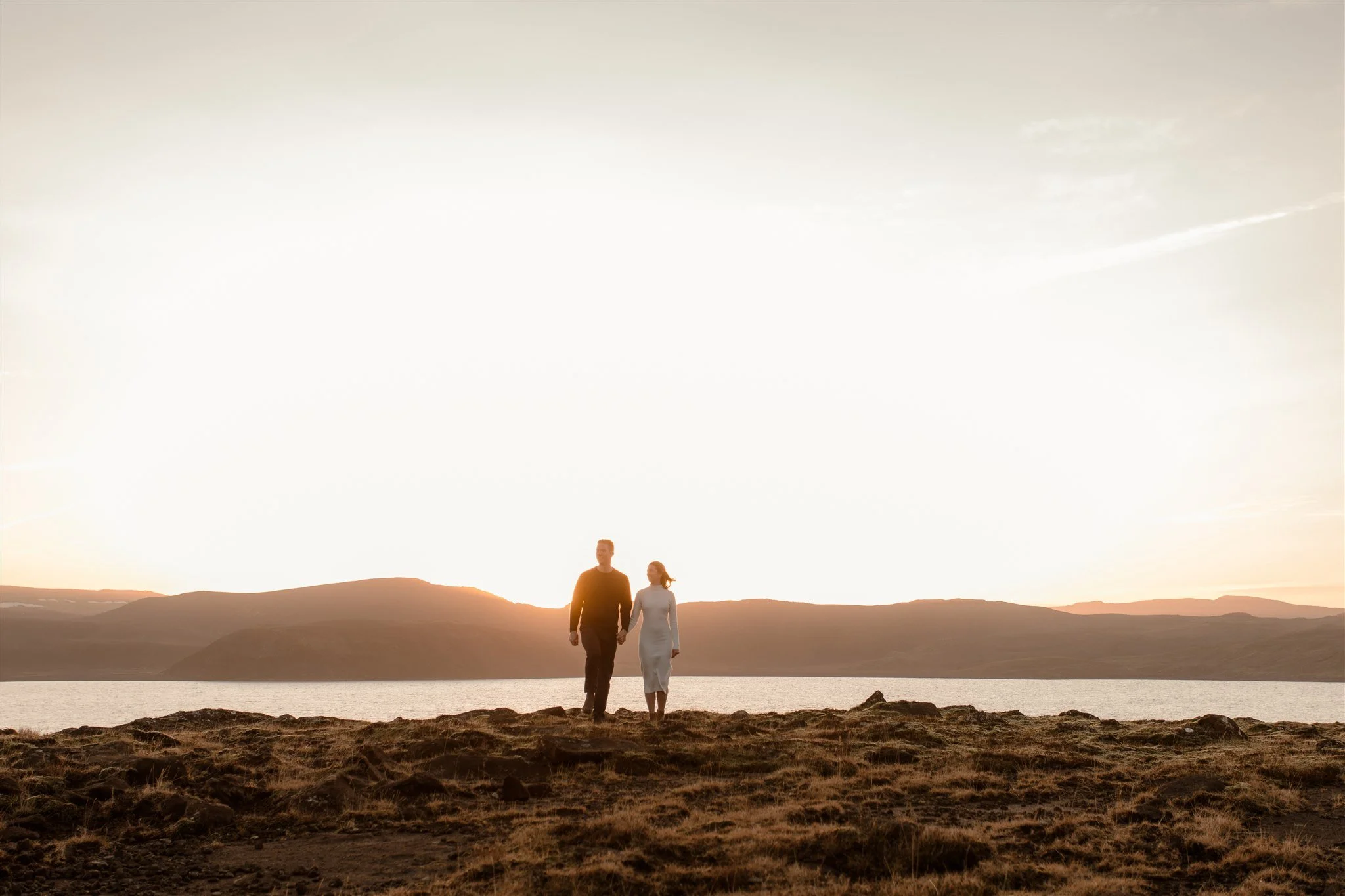  Iceland engagement photo with sunrise dreamy light with couple by water by Iceland engagement proposal photographer steph zakas 