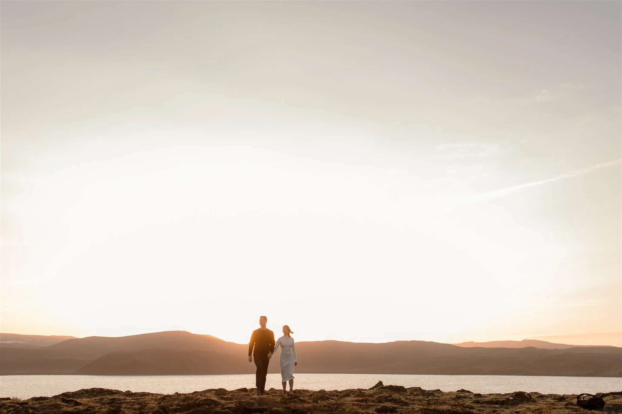  Iceland engagement photo with sunrise dreamy light with couple by water by Iceland engagement proposal photographer steph zakas 