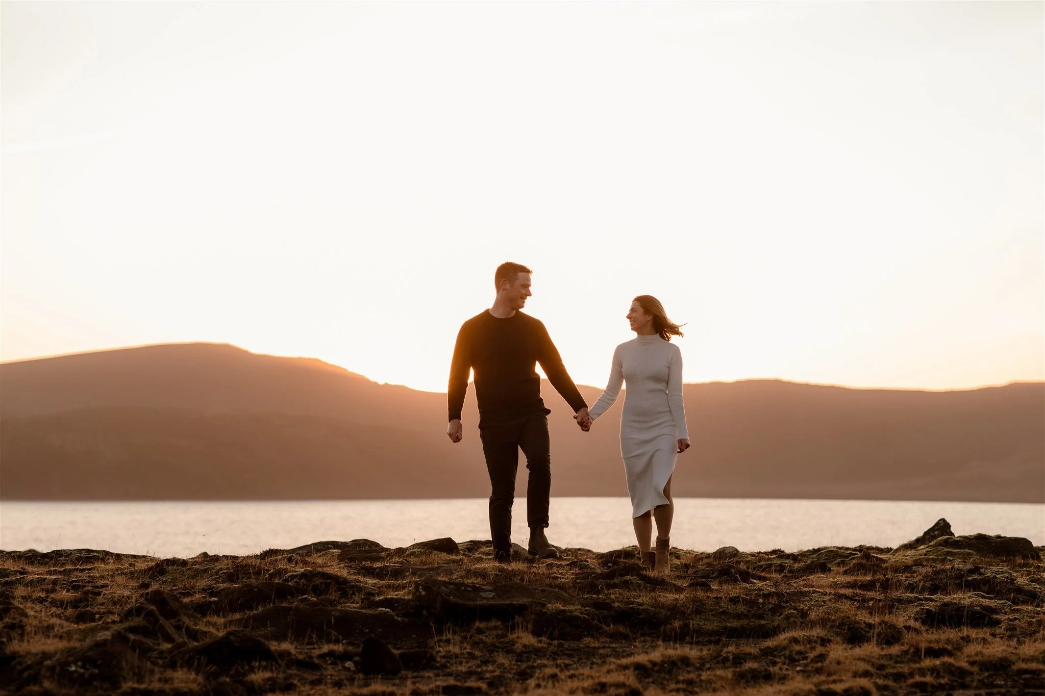  Iceland engagement photo with sunrise dreamy light with couple by water by Iceland engagement proposal photographer steph zakas 