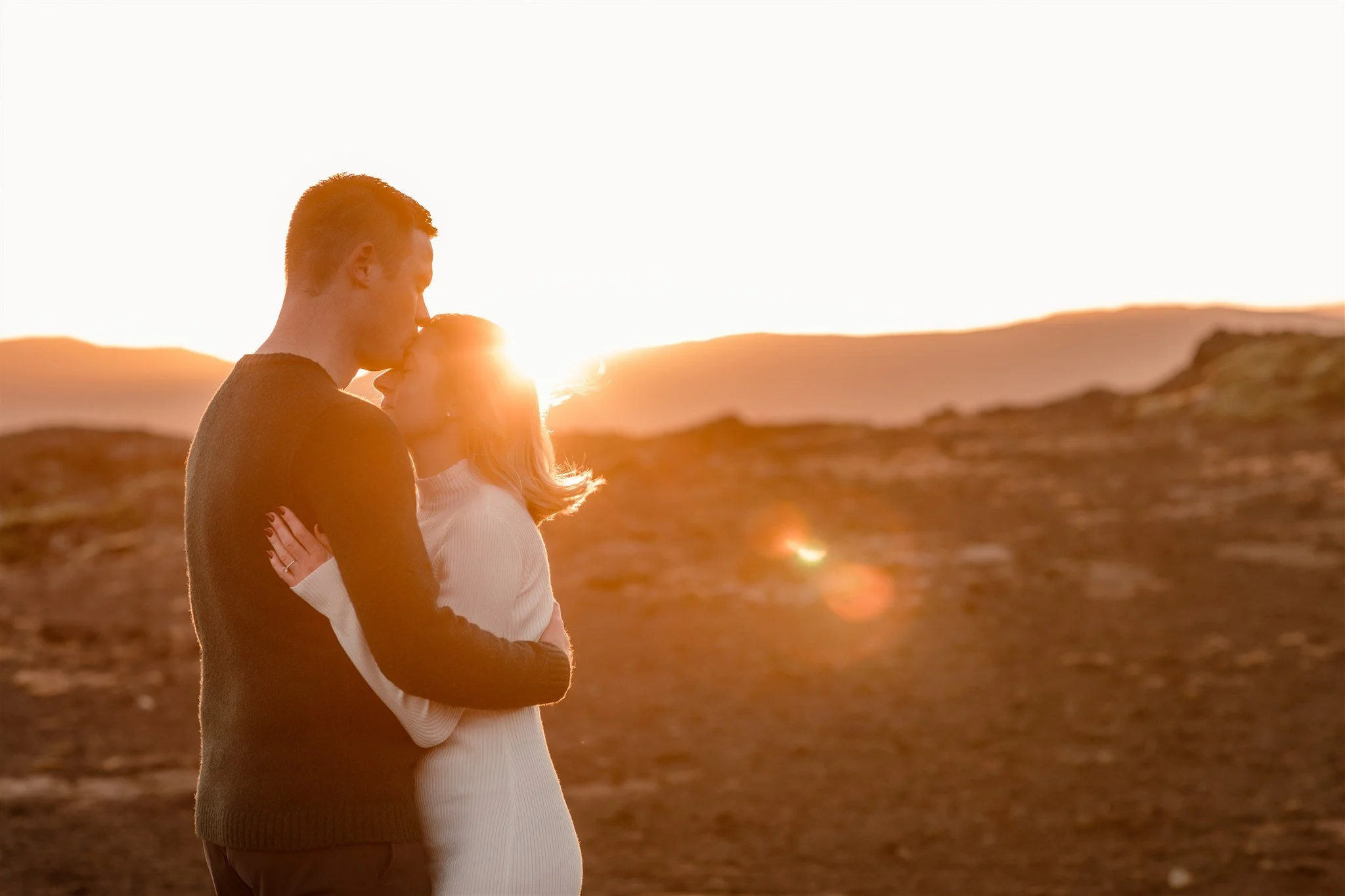  Iceland engagement photo with sunrise dreamy light with couple by water by Iceland engagement proposal photographer steph zakas 