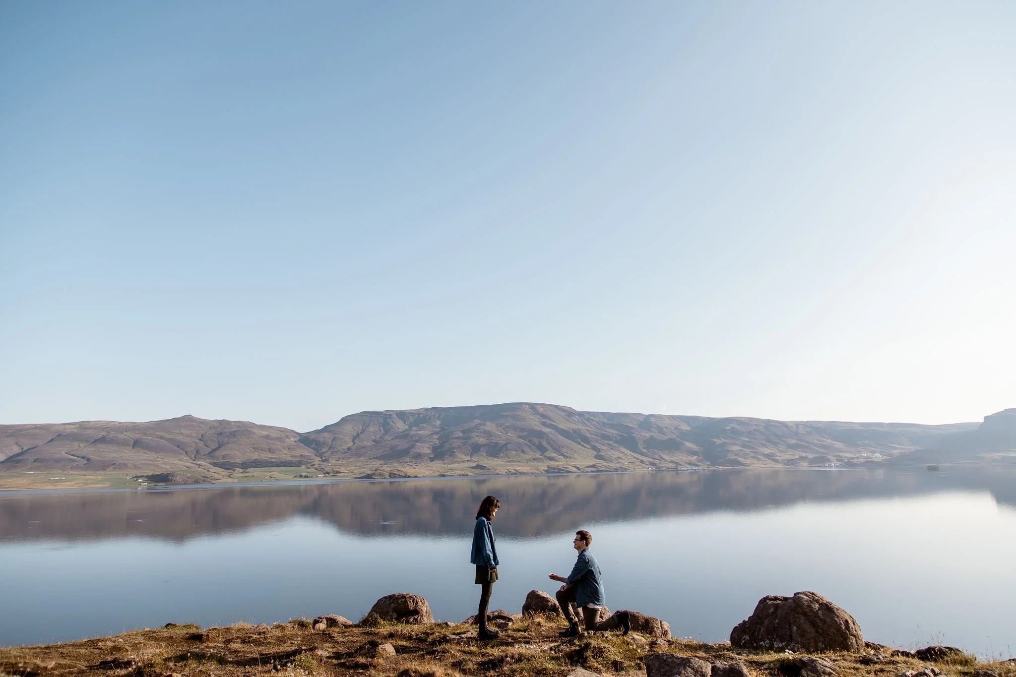 Secret Proposal Engagement Photoshoot in Iceland with a Mountain View