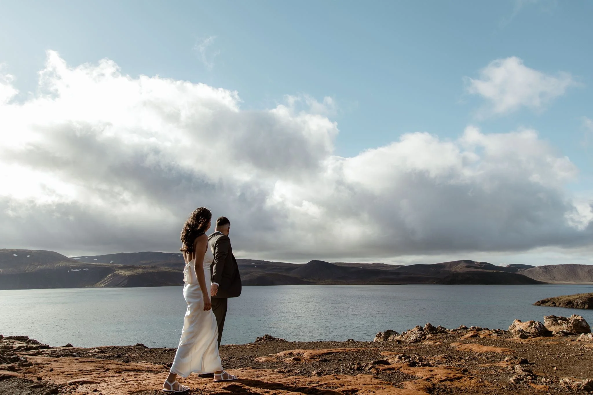  Secret Iceland Proposal close to the Blue Lagoon — couple’s Iceland photo session before the Iceland proposal couple walking   
