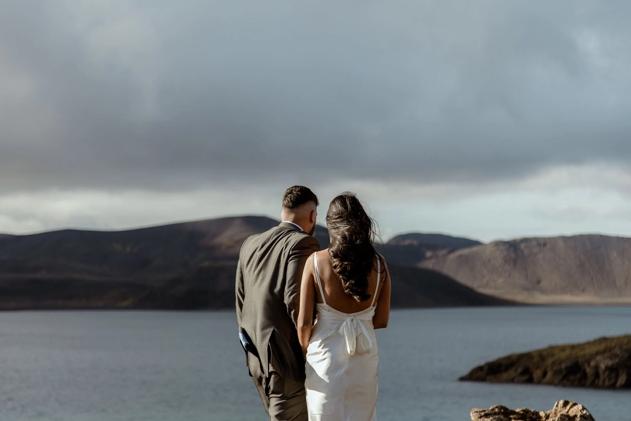  Secret Iceland Proposal close to the Blue Lagoon — couple’s Iceland photo session before the Iceland proposal couple walking   