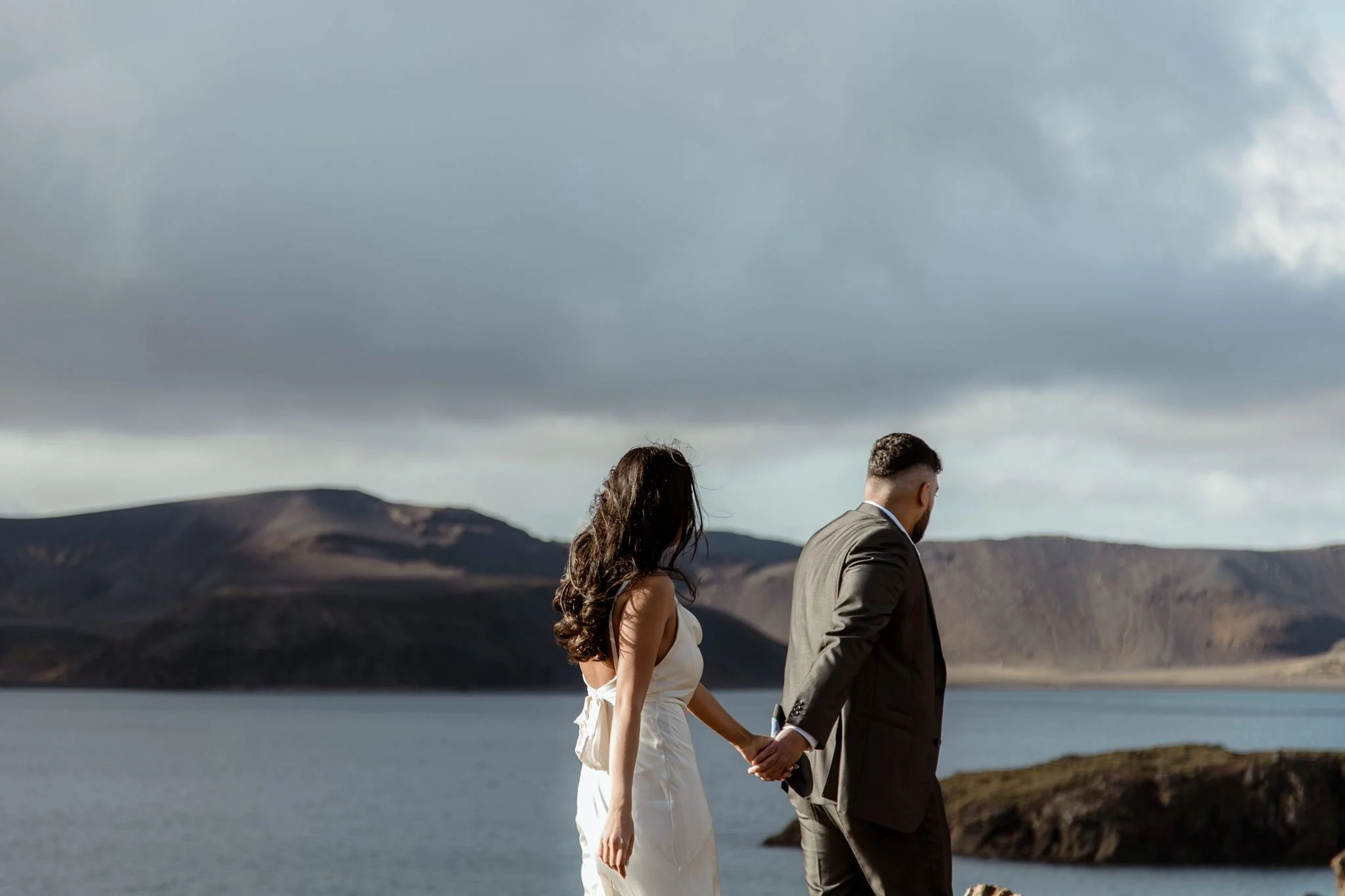  Secret Iceland Proposal close to the Blue Lagoon — couple’s Iceland photo session before the Iceland proposal couple walking   