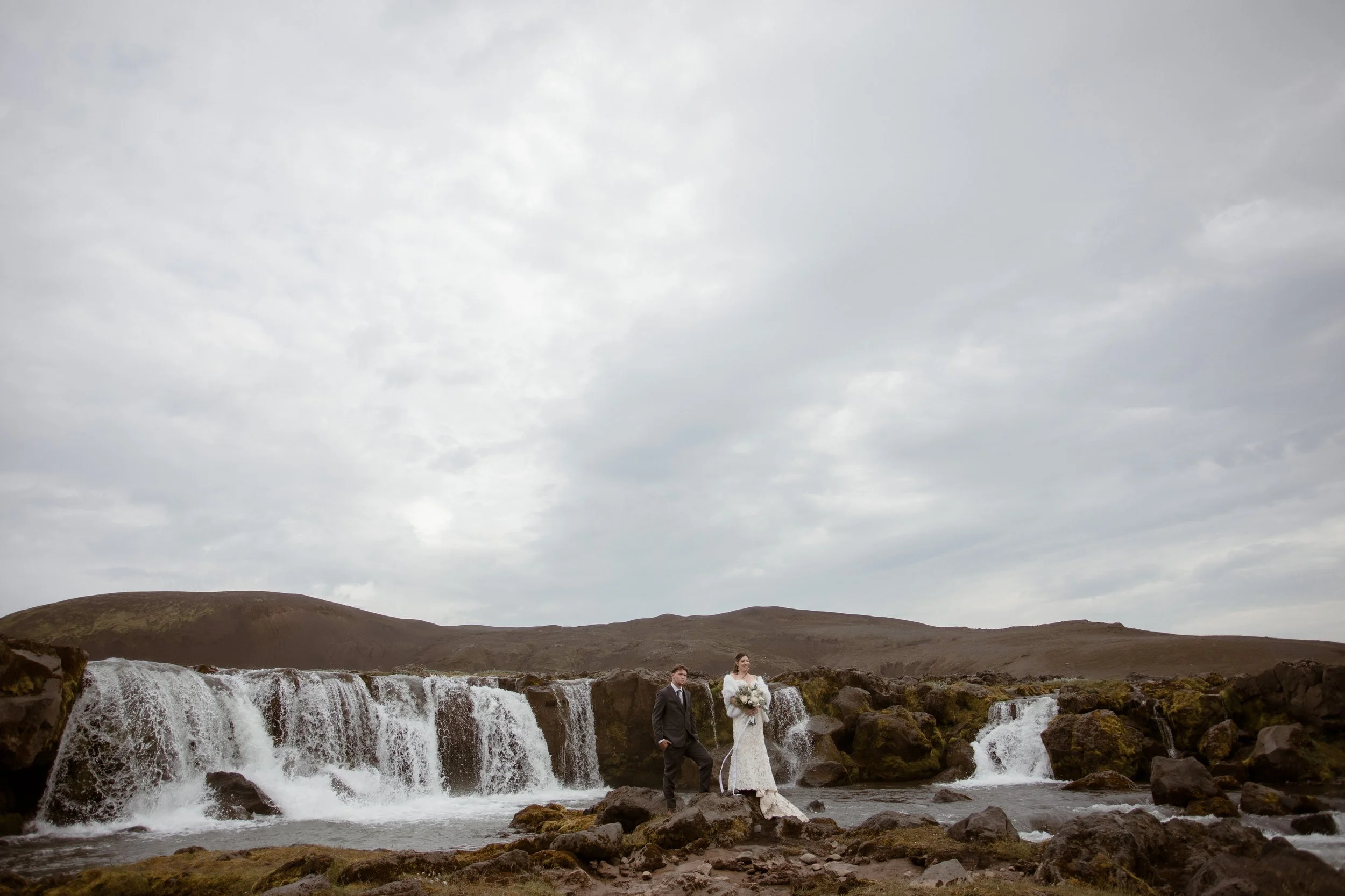 highland iceland elopement at remote secluded private waterfall on mountain truck elopement