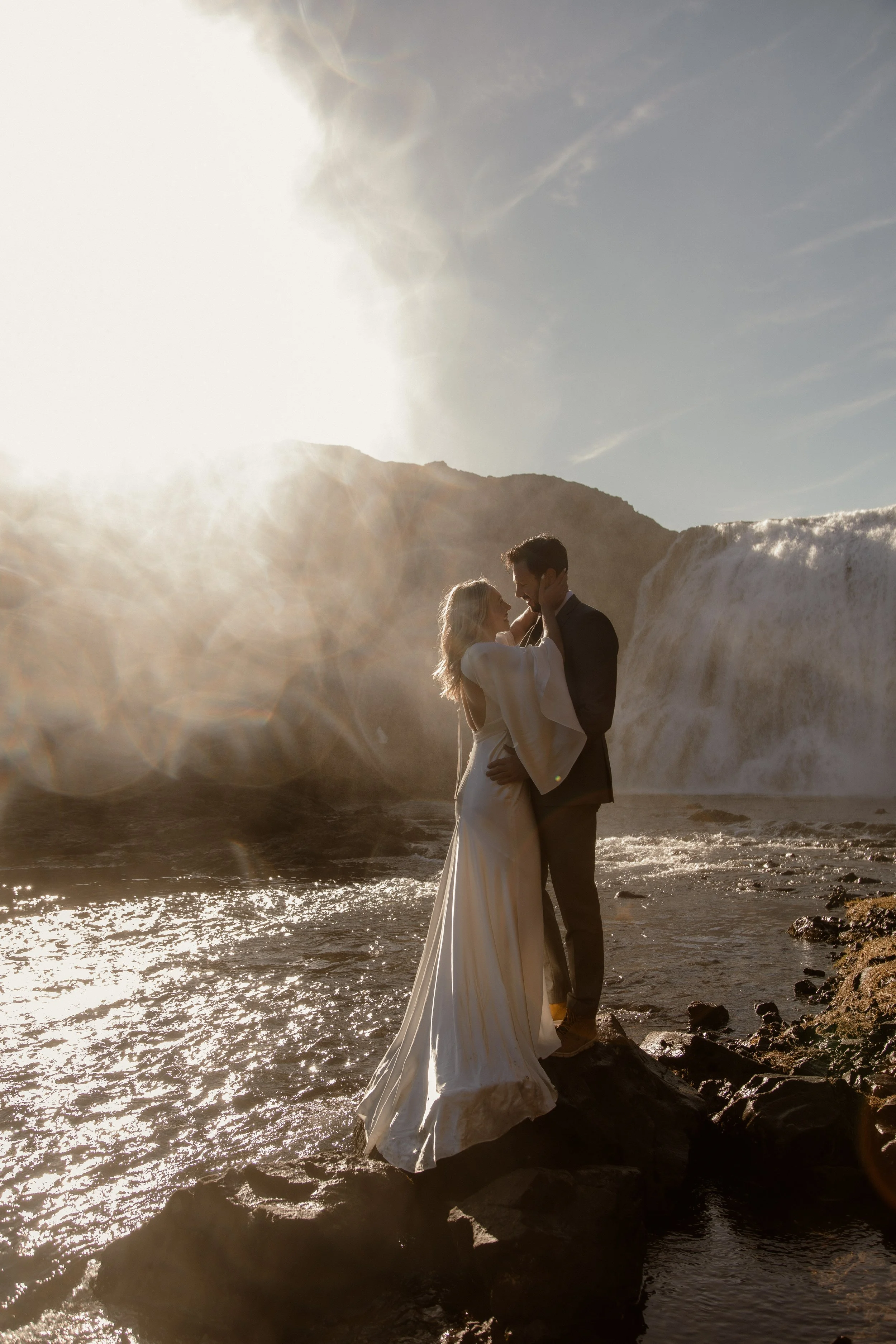 Iceland elopement at private waterfall with mist