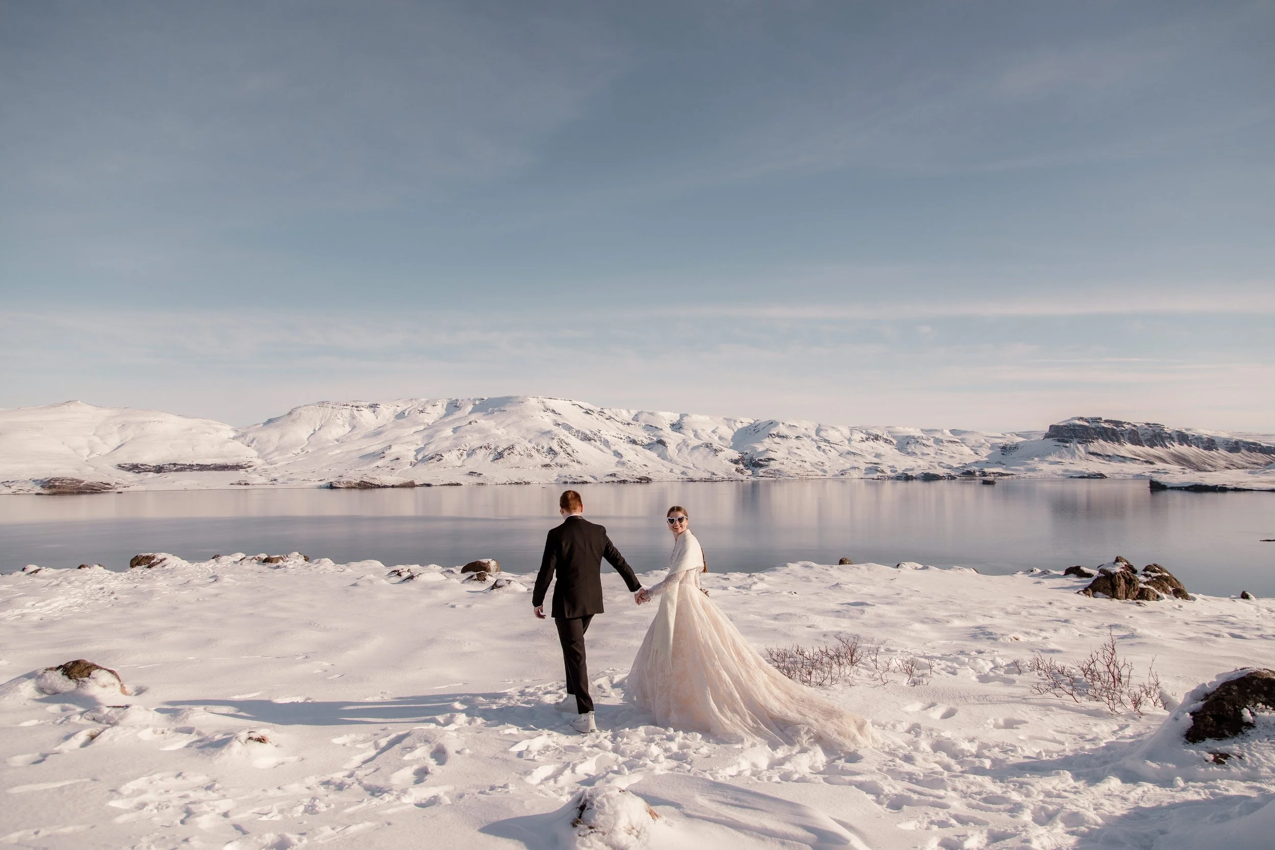 Winter Iceland elopement with couple smiling