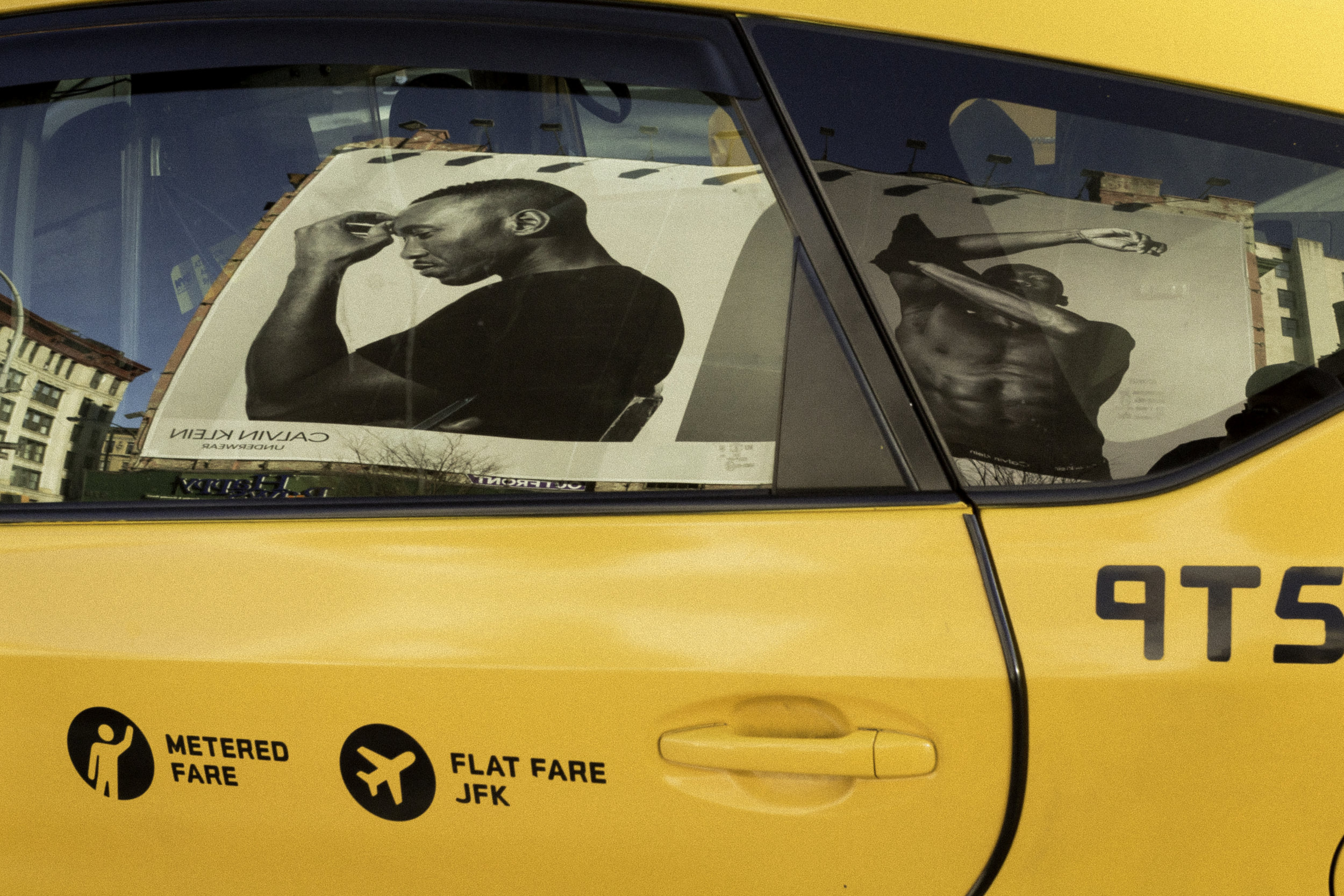 Calvin_Klein_Models_Reflected_in_Taxi.jpg