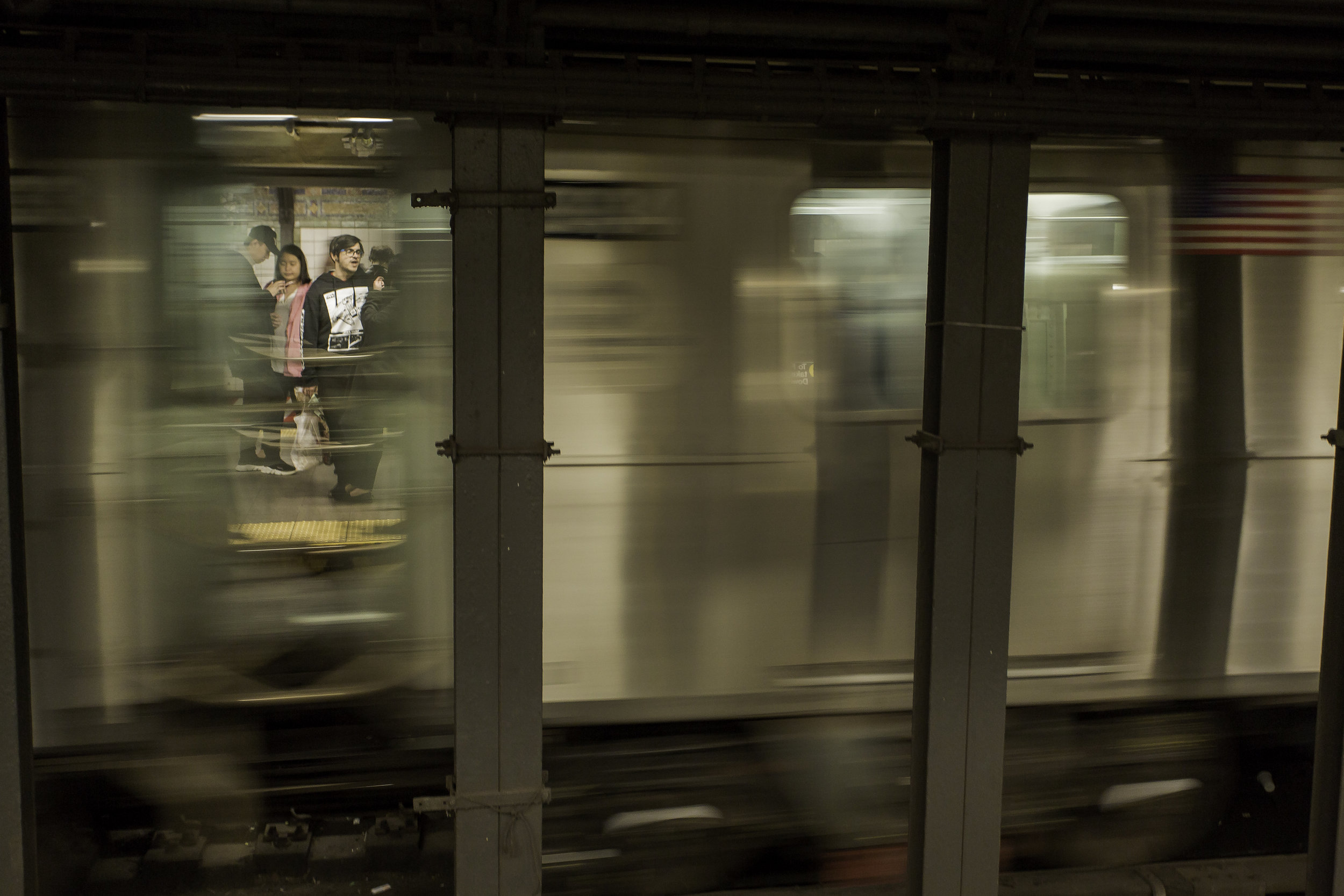 Glimpse_of_Passengers_Moving_Train.jpg