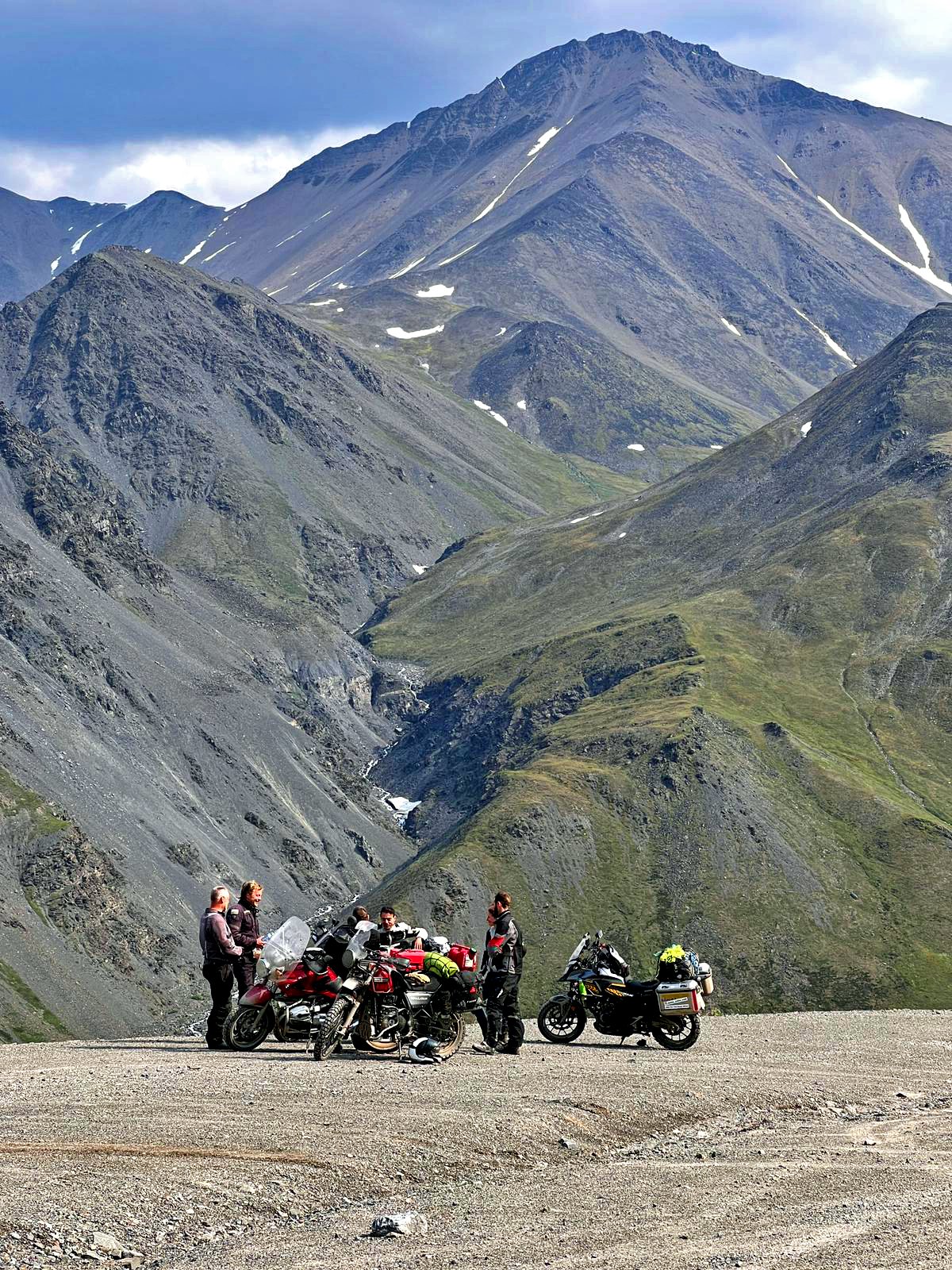  New friends gather on Atigun Pass to take in the majesty and celebrate their accomplishment. 