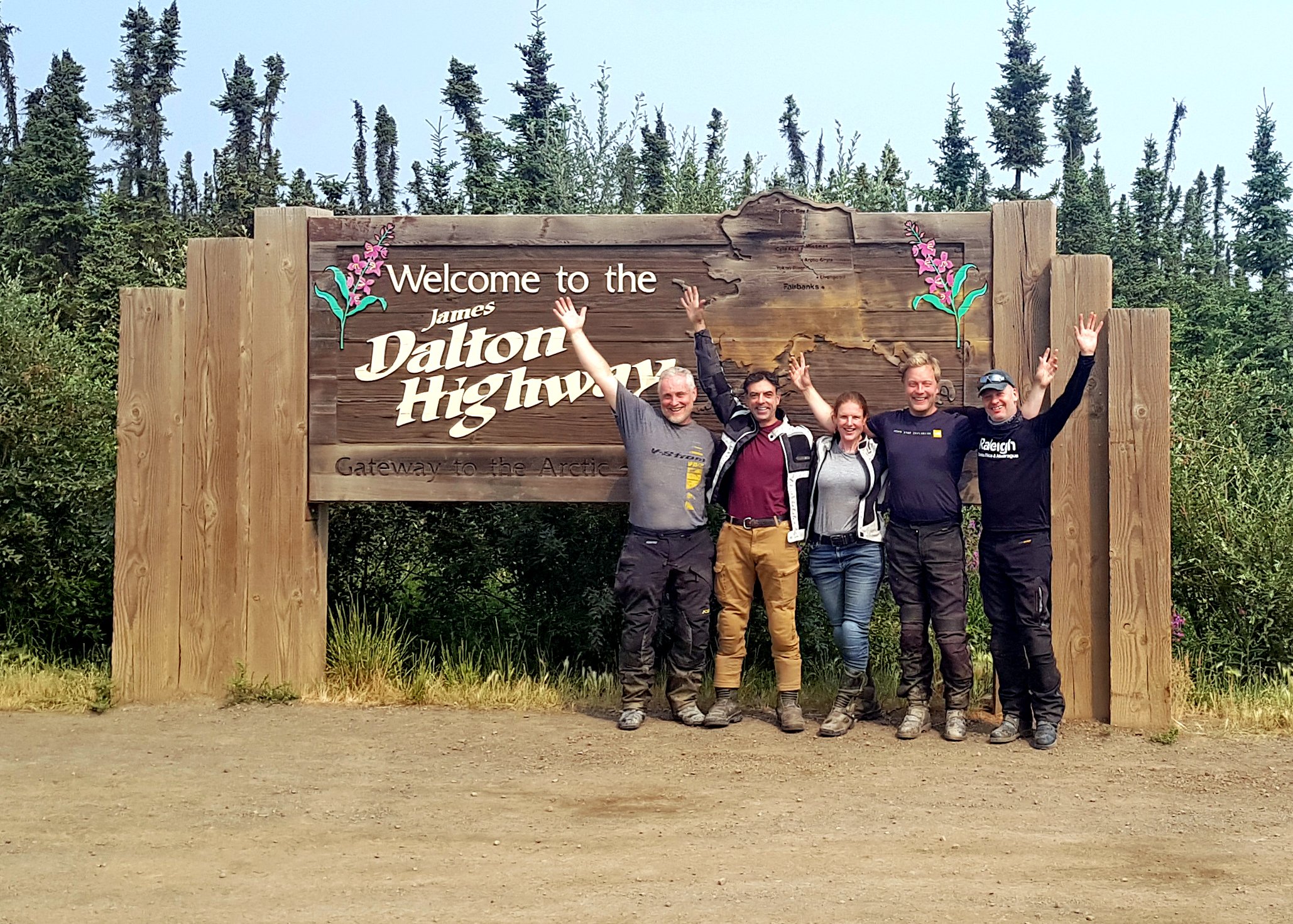  Having ridden together for all or most of the Dalton, and joining up for dinner in Coldfoot and Deadhorse, the “Dalton Dinner Club” celebrates their accomplishment. 