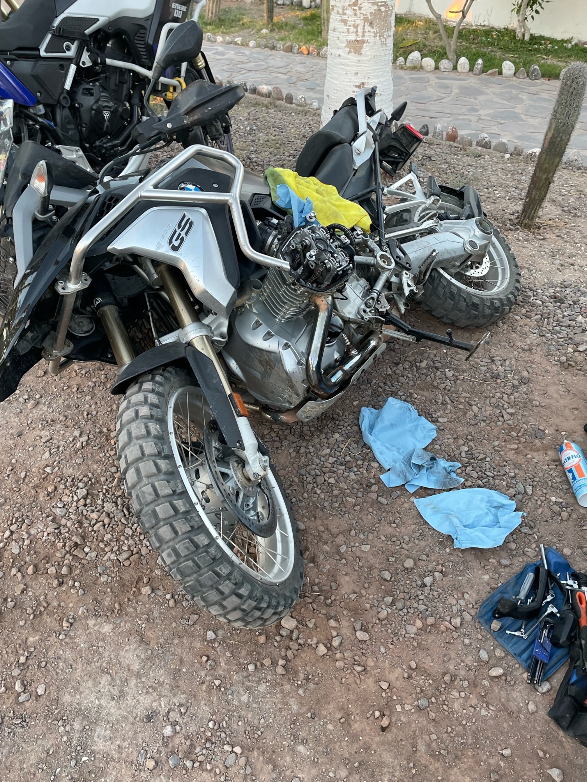 Motorcycle on ground being repaired